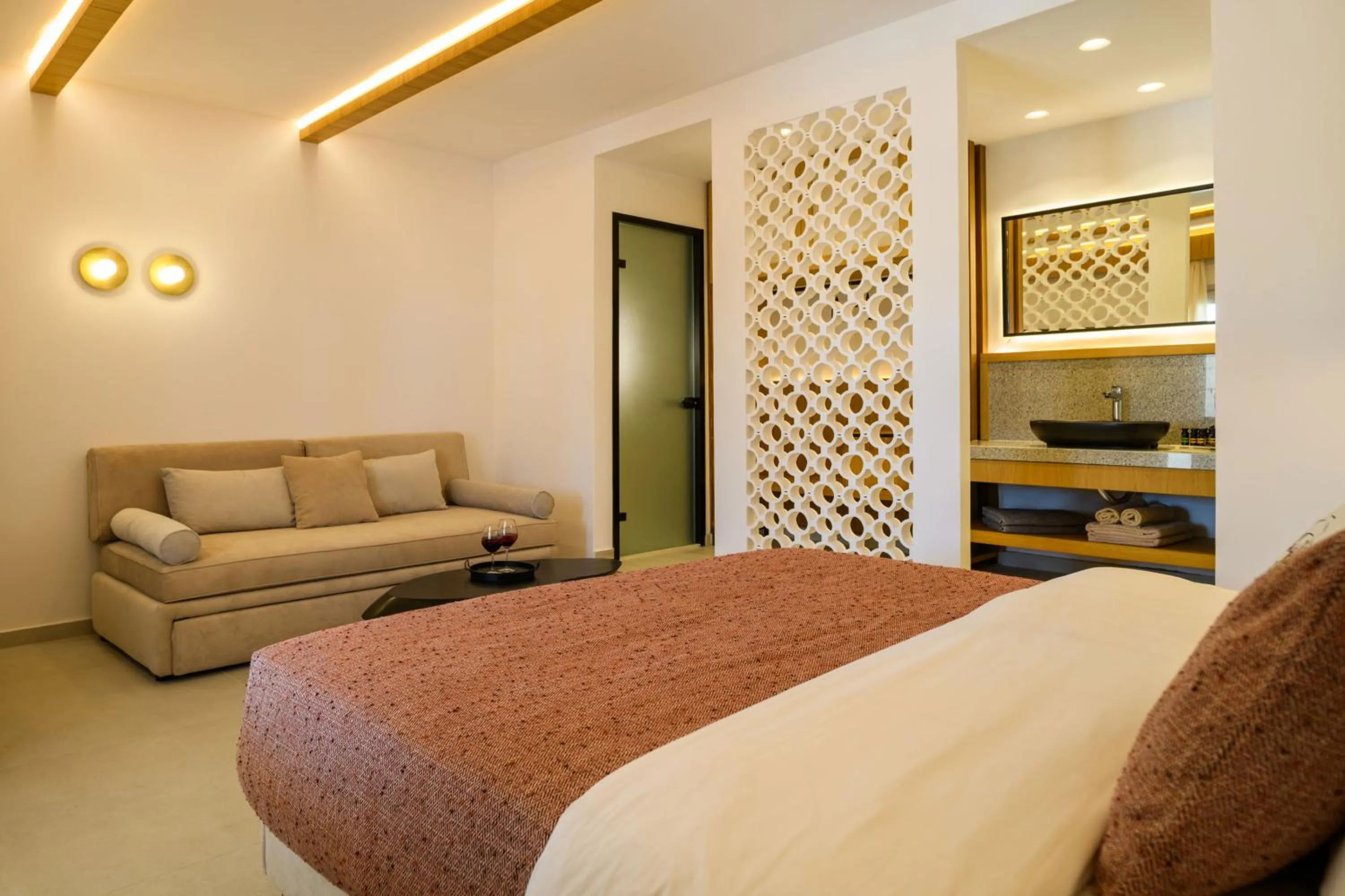 Bed in Safrani Suites