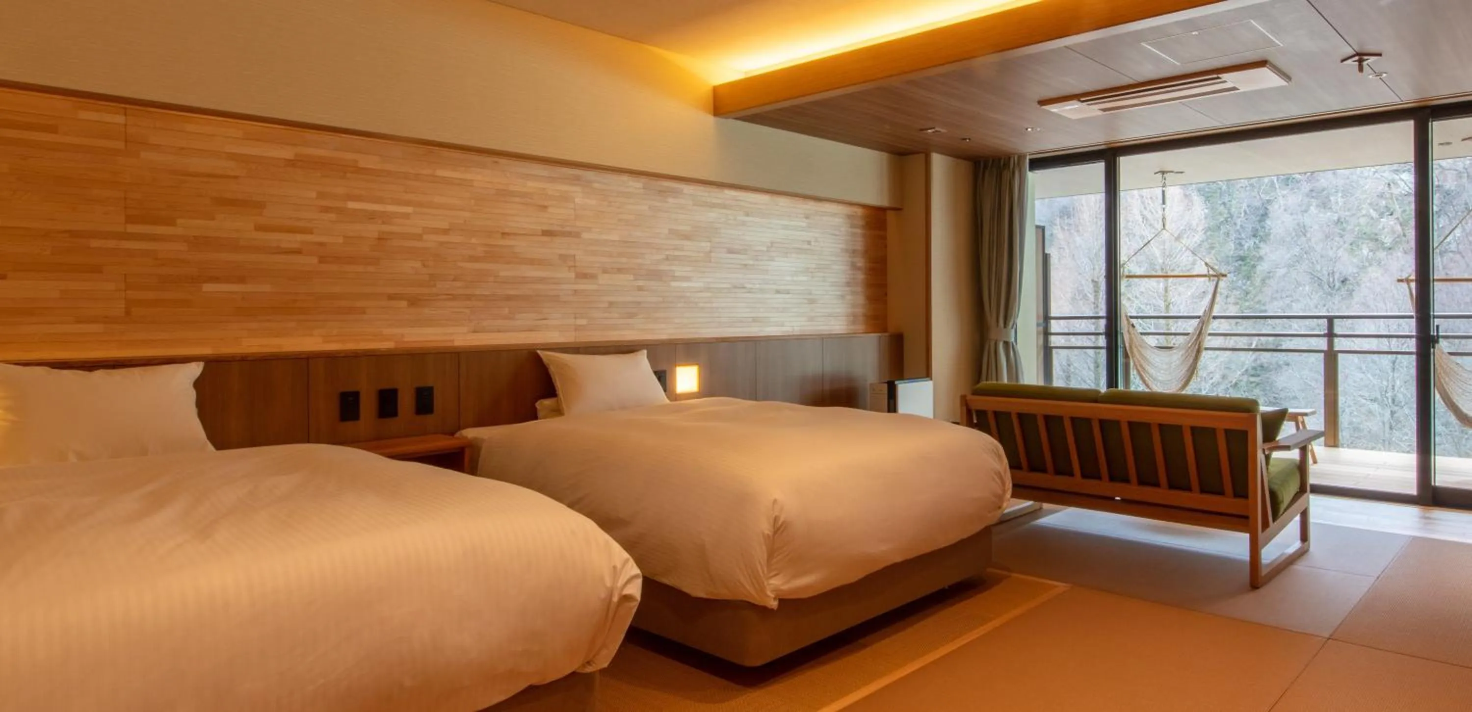 Bed in Sakunami Onsen Yuzukushi Salon Ichinobo