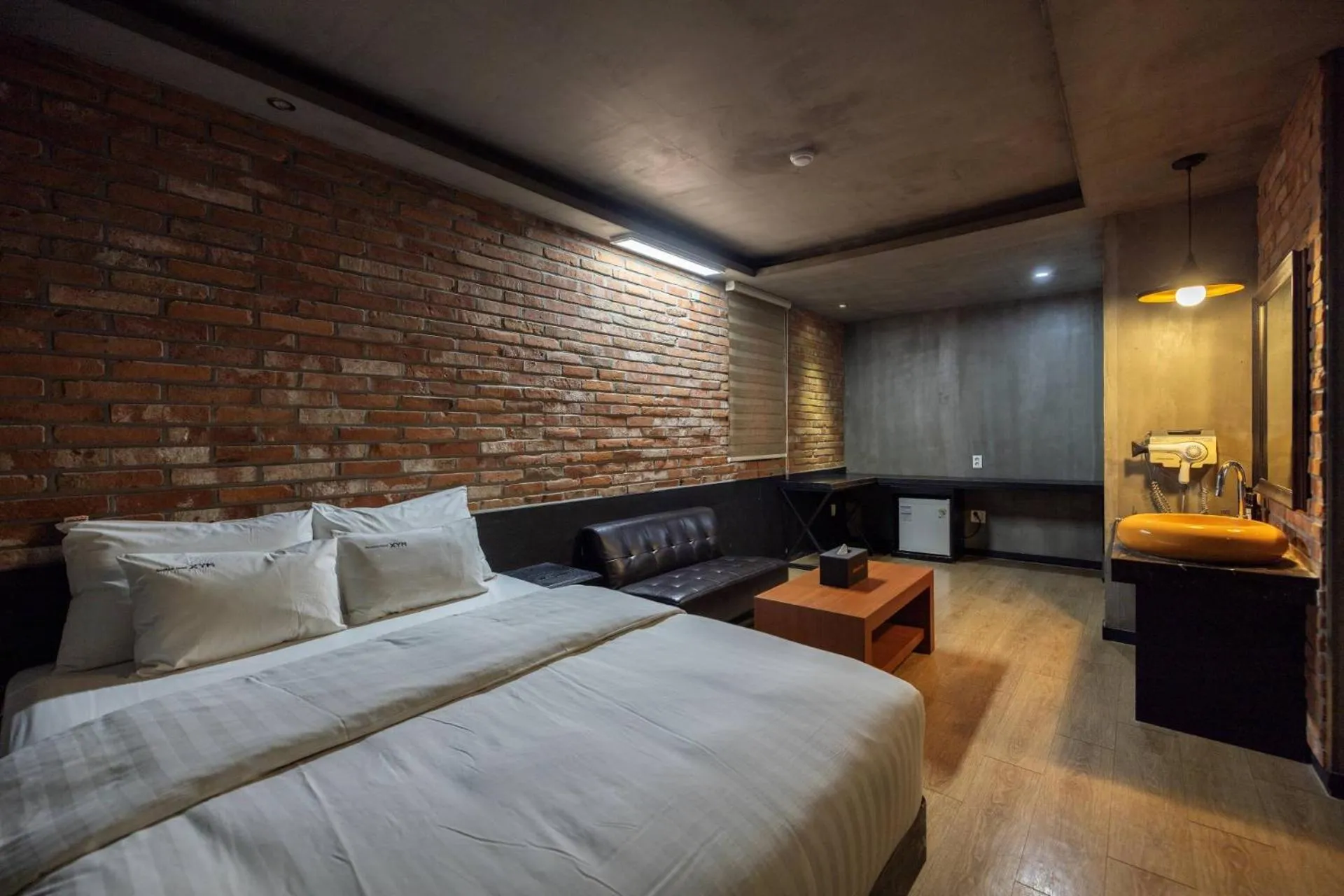Bed in XYM Hotel Icheon