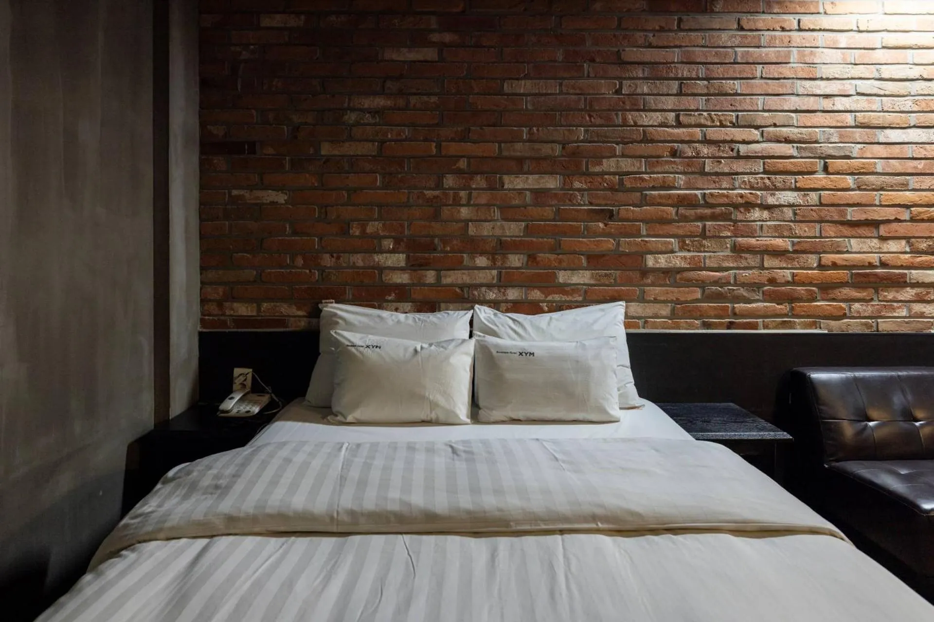 Bed in XYM Hotel Icheon