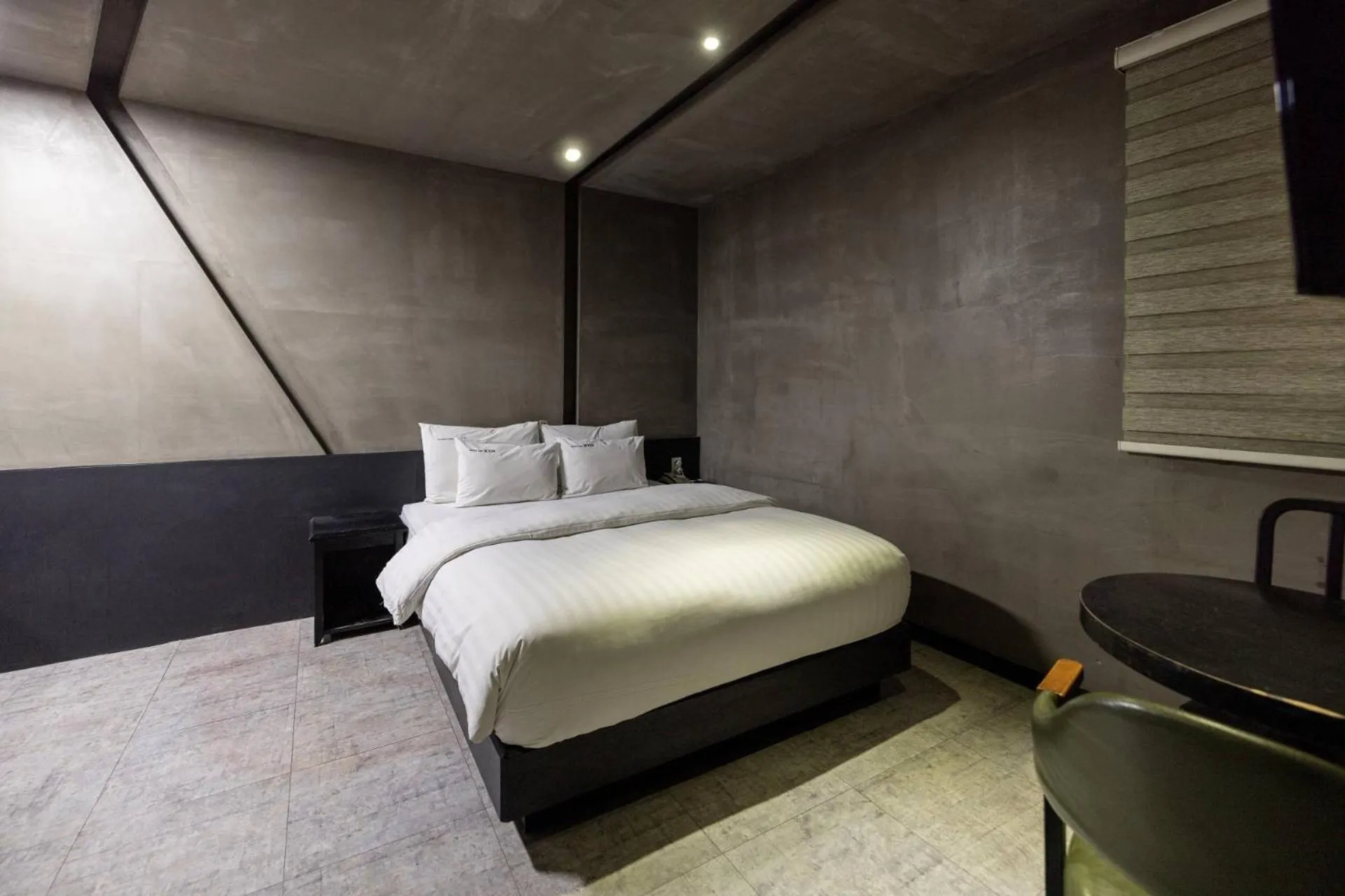 Bed in XYM Hotel Icheon