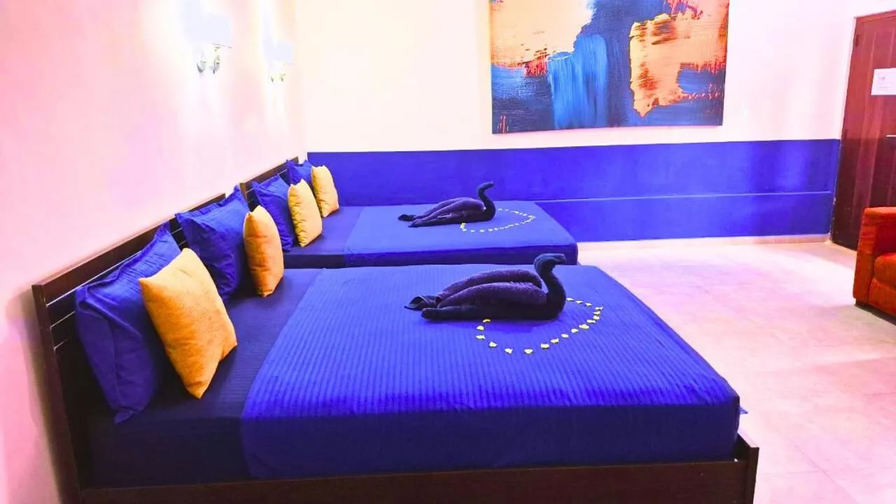 Bed in Sea Breeze Hotel