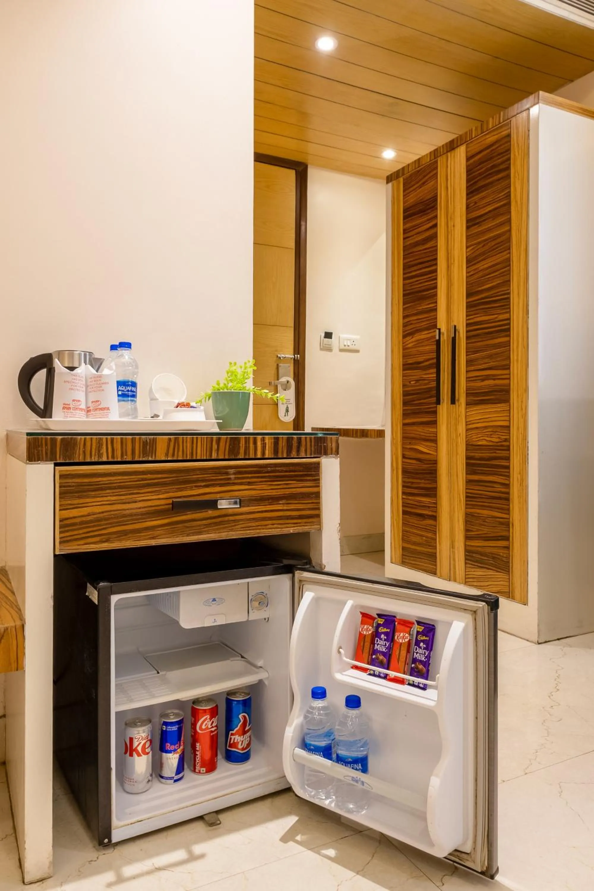 minibar in Aman Continental With Restaurant - 5Mins from Connaught Place ,Railway Station & Metro