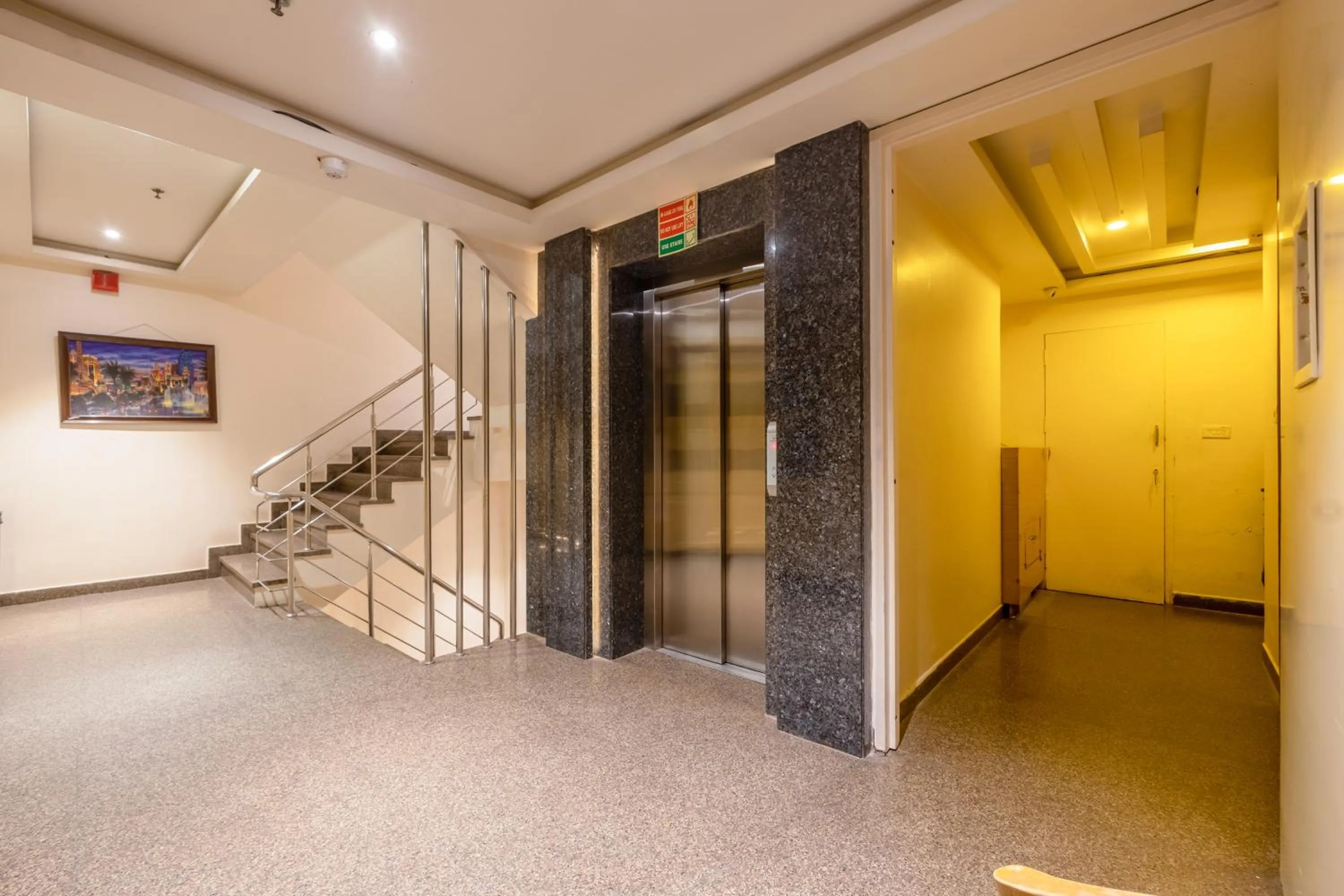 elevator in Aman Continental With Restaurant - 5Mins from Connaught Place ,Railway Station & Metro