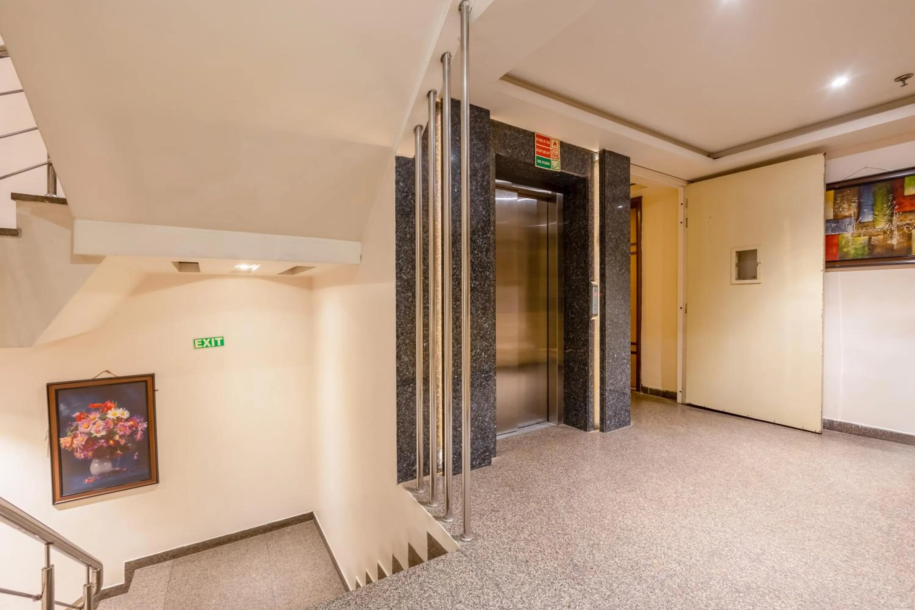 elevator in Aman Continental With Restaurant - 5Mins from Connaught Place ,Railway Station & Metro