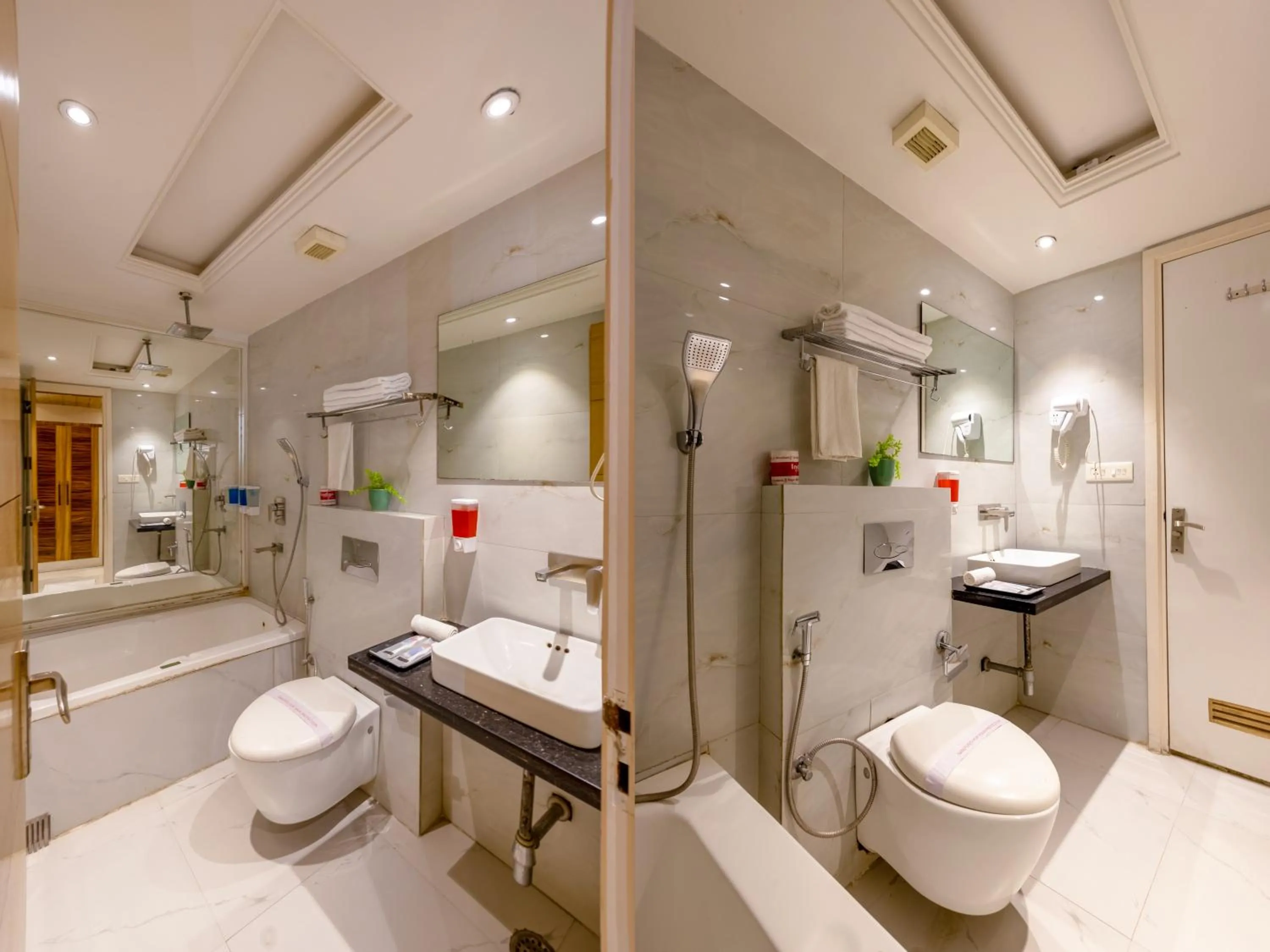 Toilet in Aman Continental With Restaurant - 5Mins from Connaught Place ,Railway Station & Metro