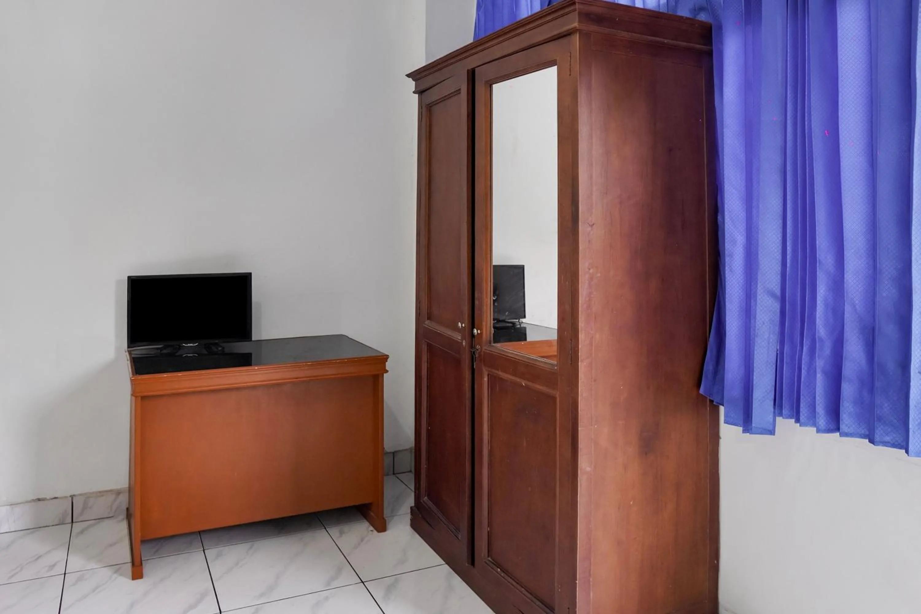 Deluxe Family Room in Collection O near Universitas Negeri Padang formerly Hotel Amra