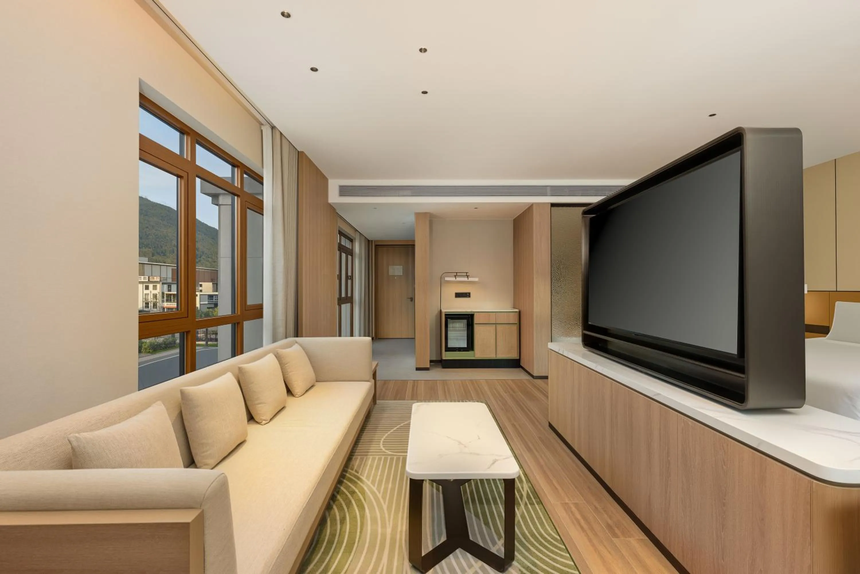 Communal lounge/ TV room in Holiday Inn Ningde Jiaocheng by IHG