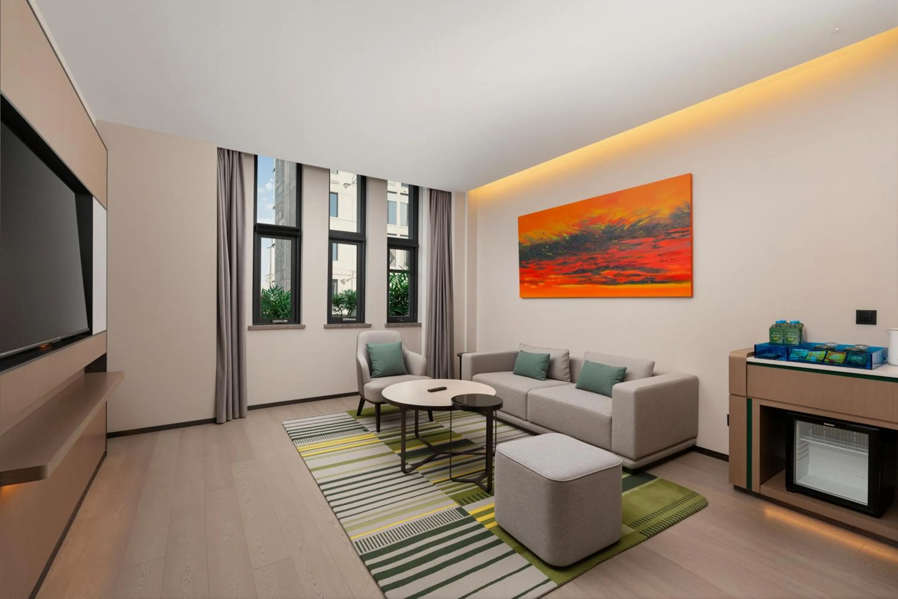 Living room in Holiday Inn Beijing Daxing Movie Park by IHG