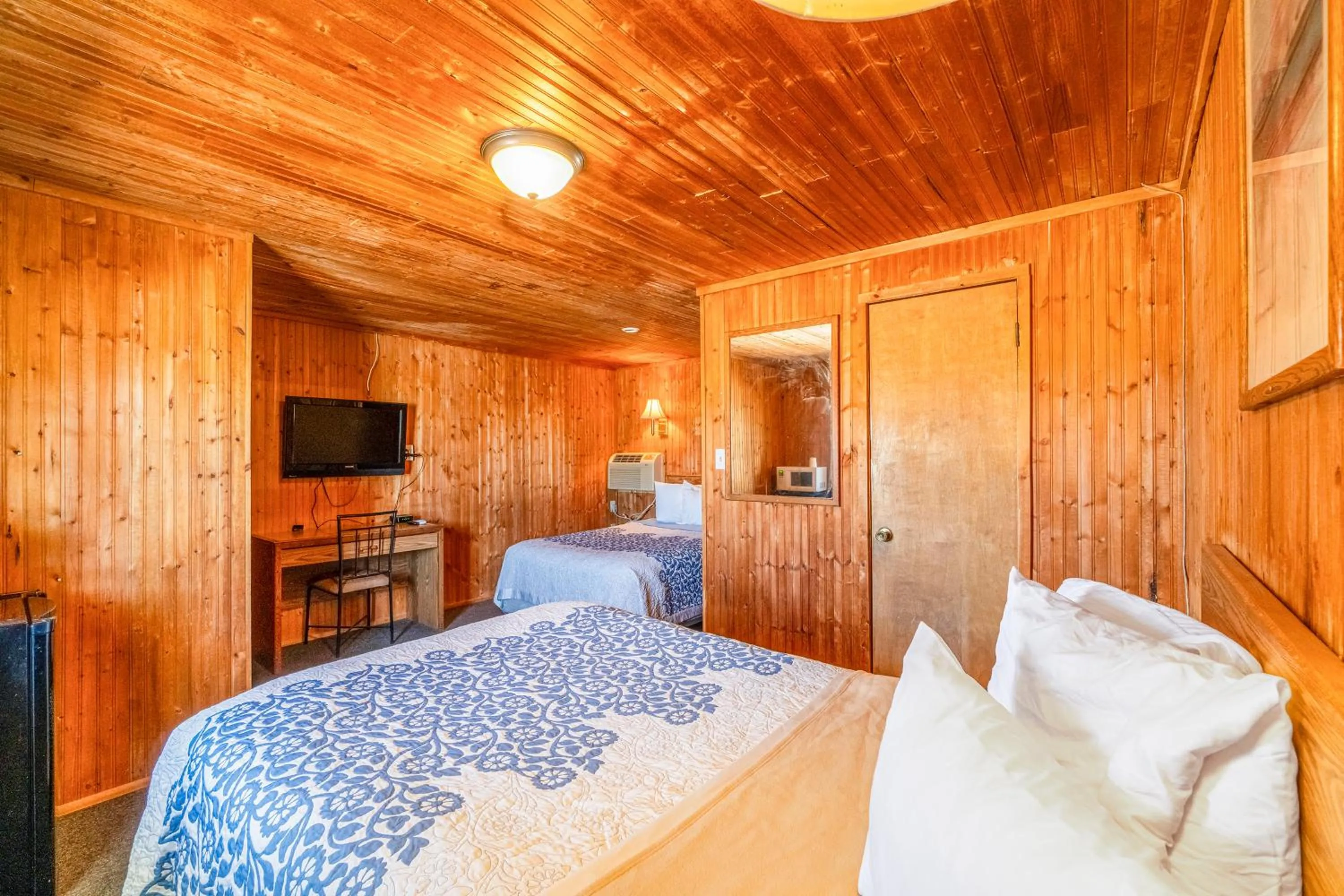 Bedroom, Bed in Green Acre Motel by OYO Near Rush County Airport