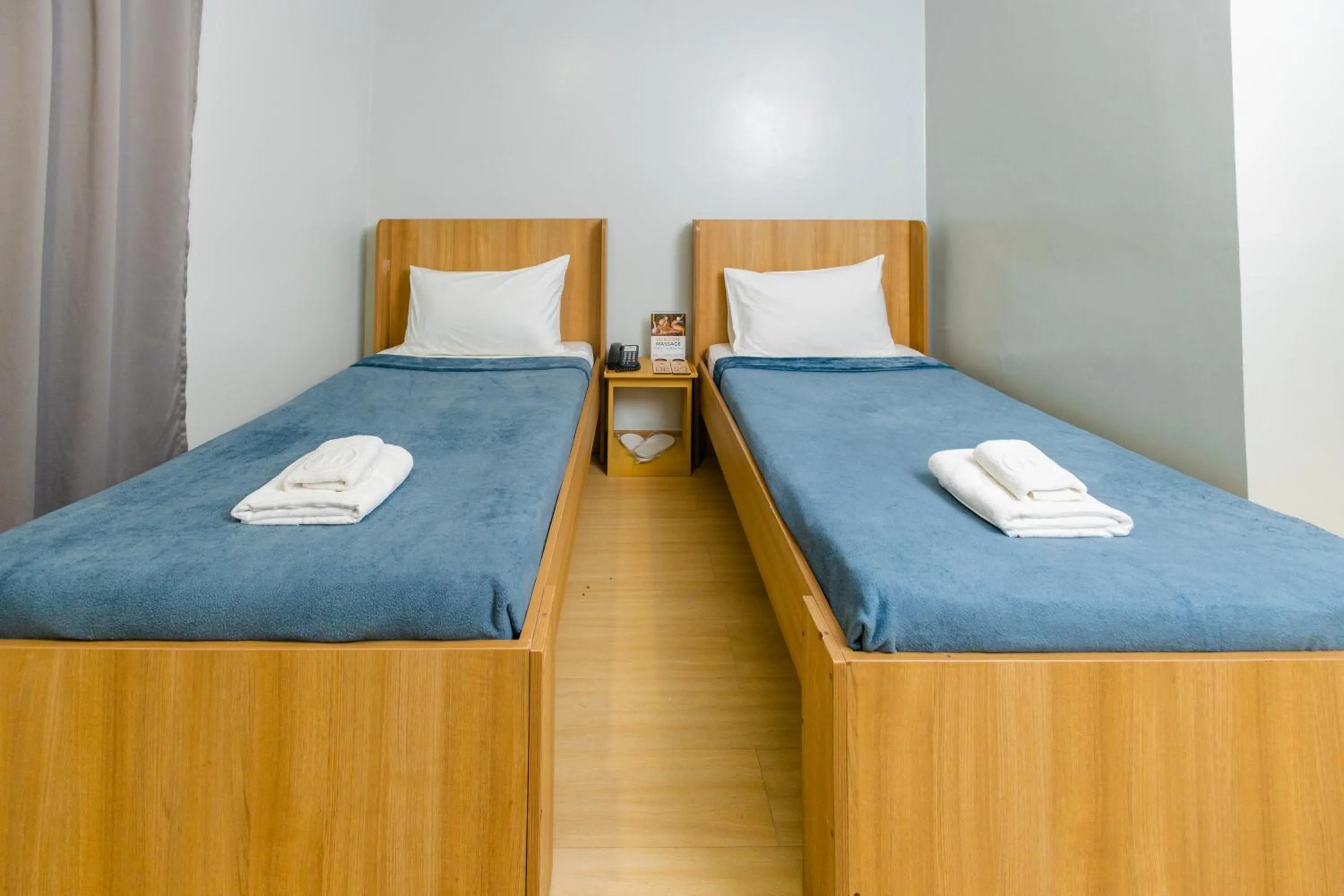 Bed in Madison 101 Hotel + Tower