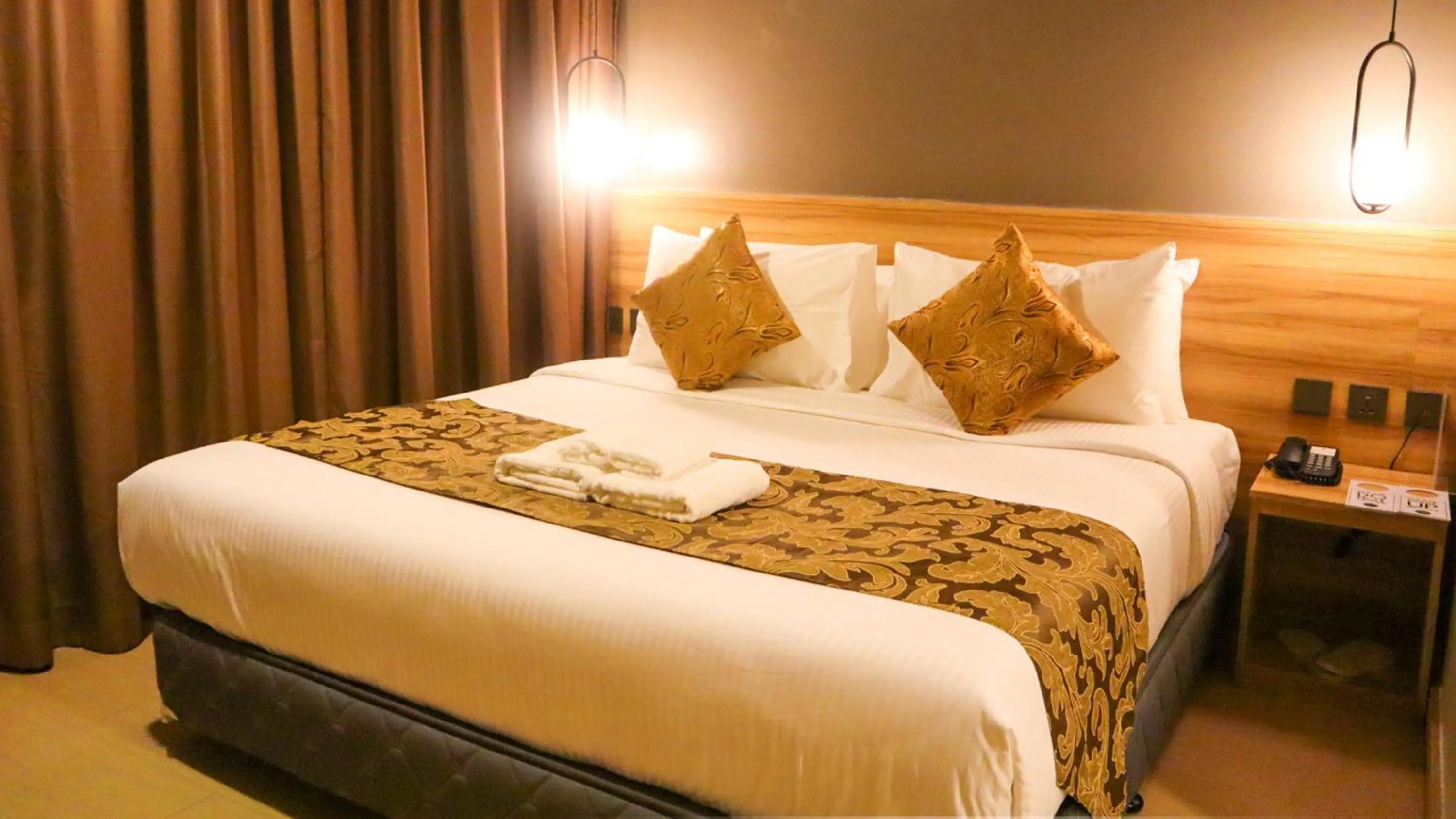 Bed in Madison 101 Hotel + Tower