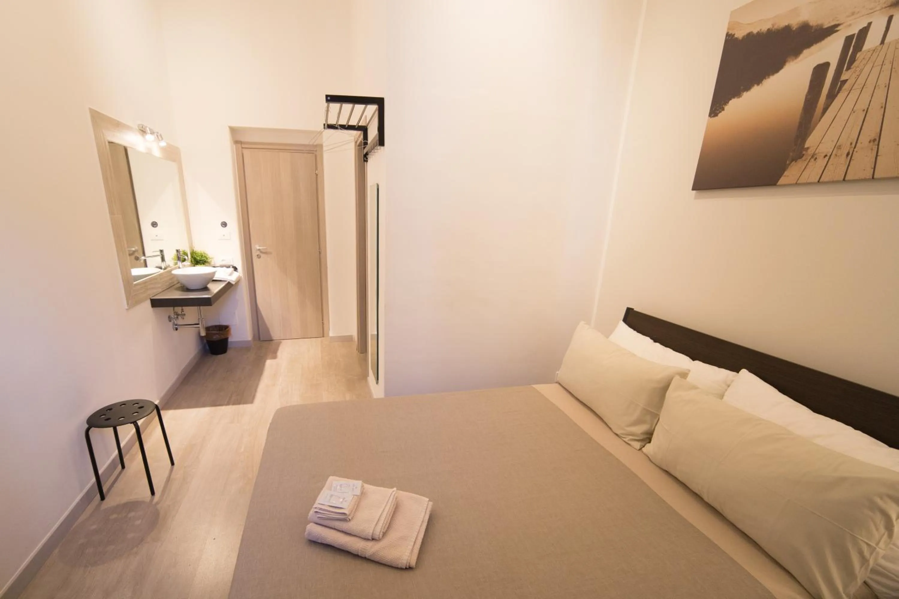 Property building, Bed in Romano Rooms