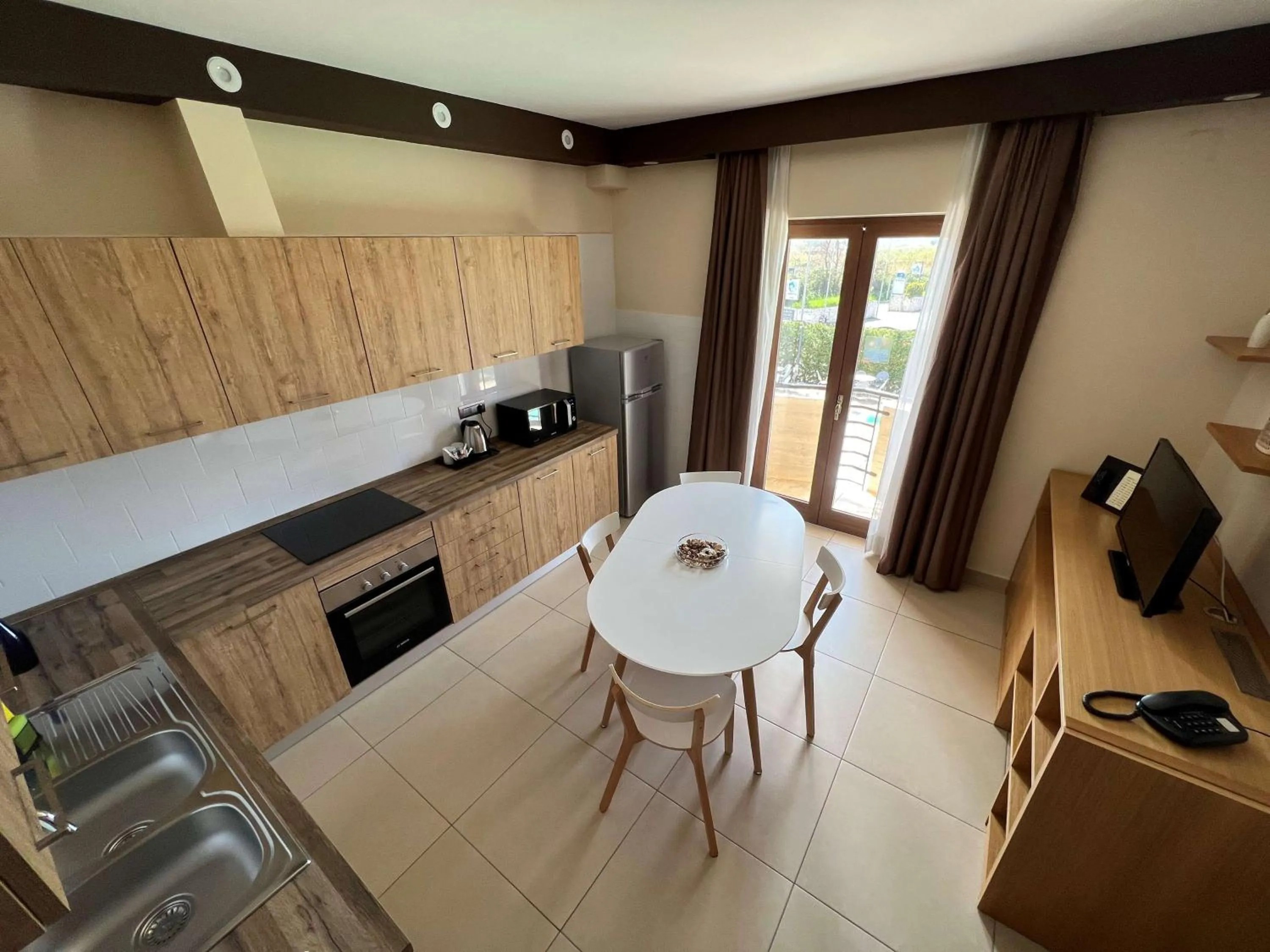 Kitchen or kitchenette in Hotel Agora Sure Hotel Collection by Best Western