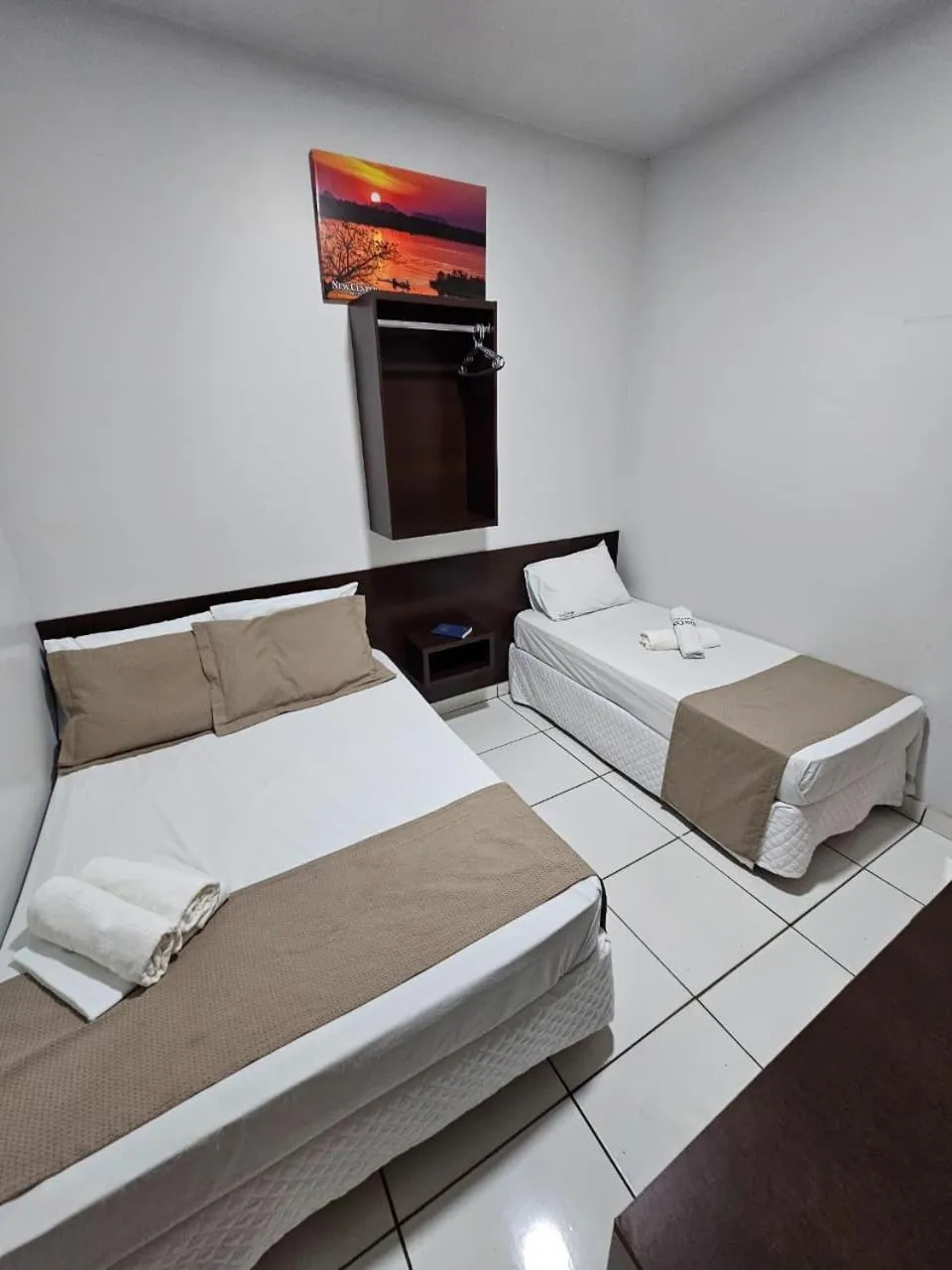Photo of the whole room, Bed in New Center Hotel