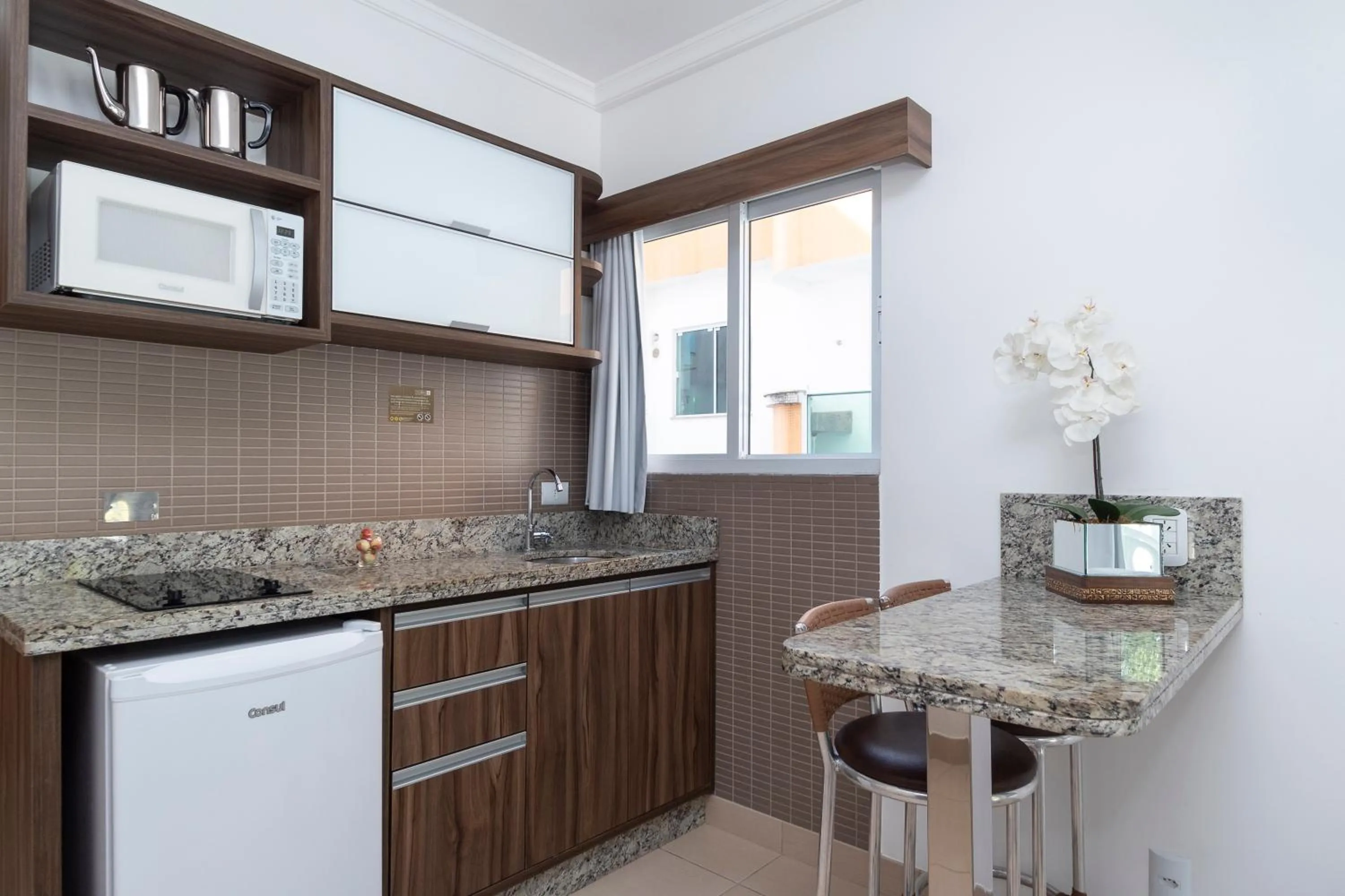 Kitchen or kitchenette in Pousada Riviera Bombinhas