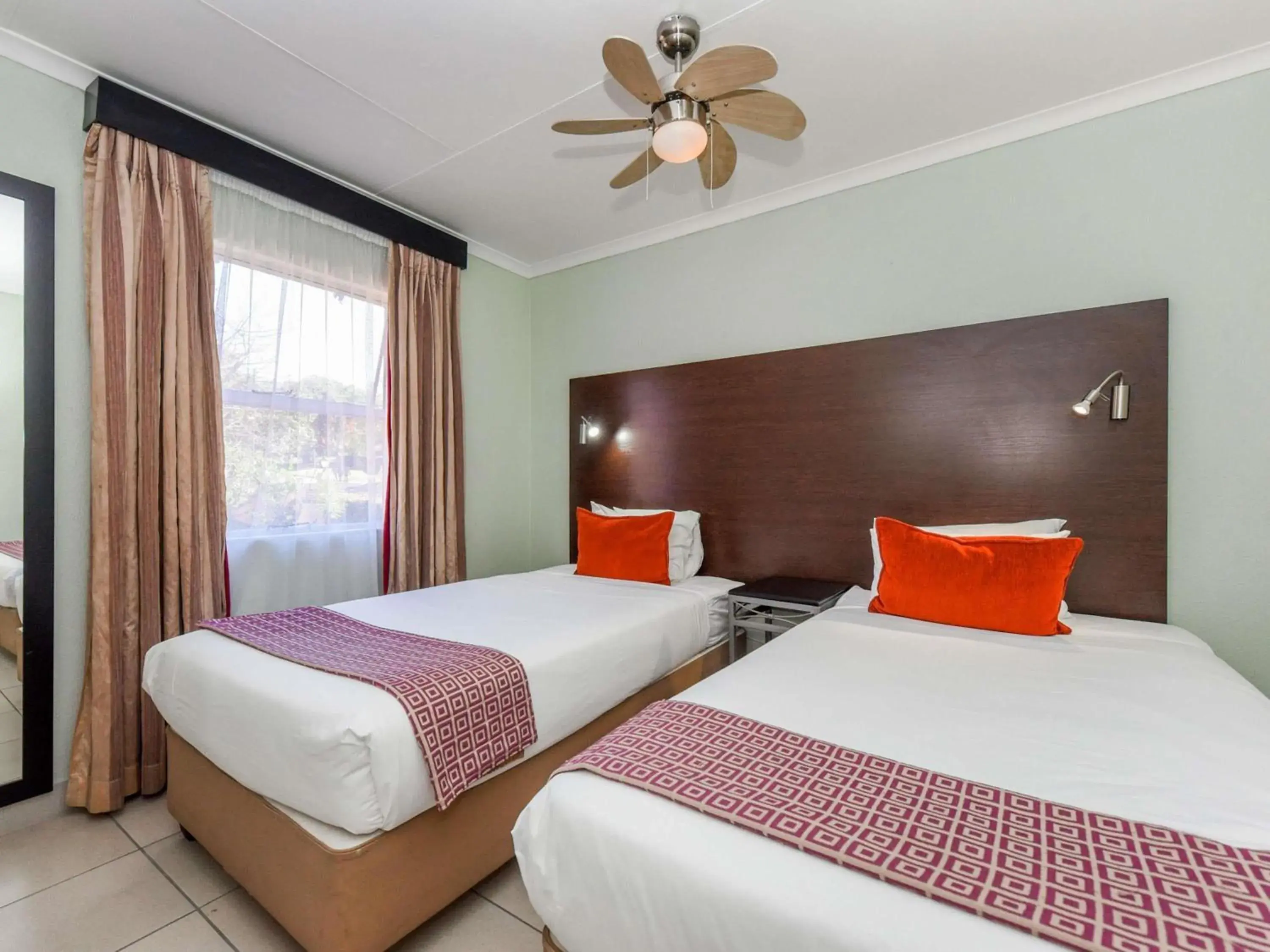 Superior Room with One Double and Two Single Beds in Mercure Hotel Nelspruit Superior Room with One Double and Two Single Beds in Mercure Hotel Nelspruit