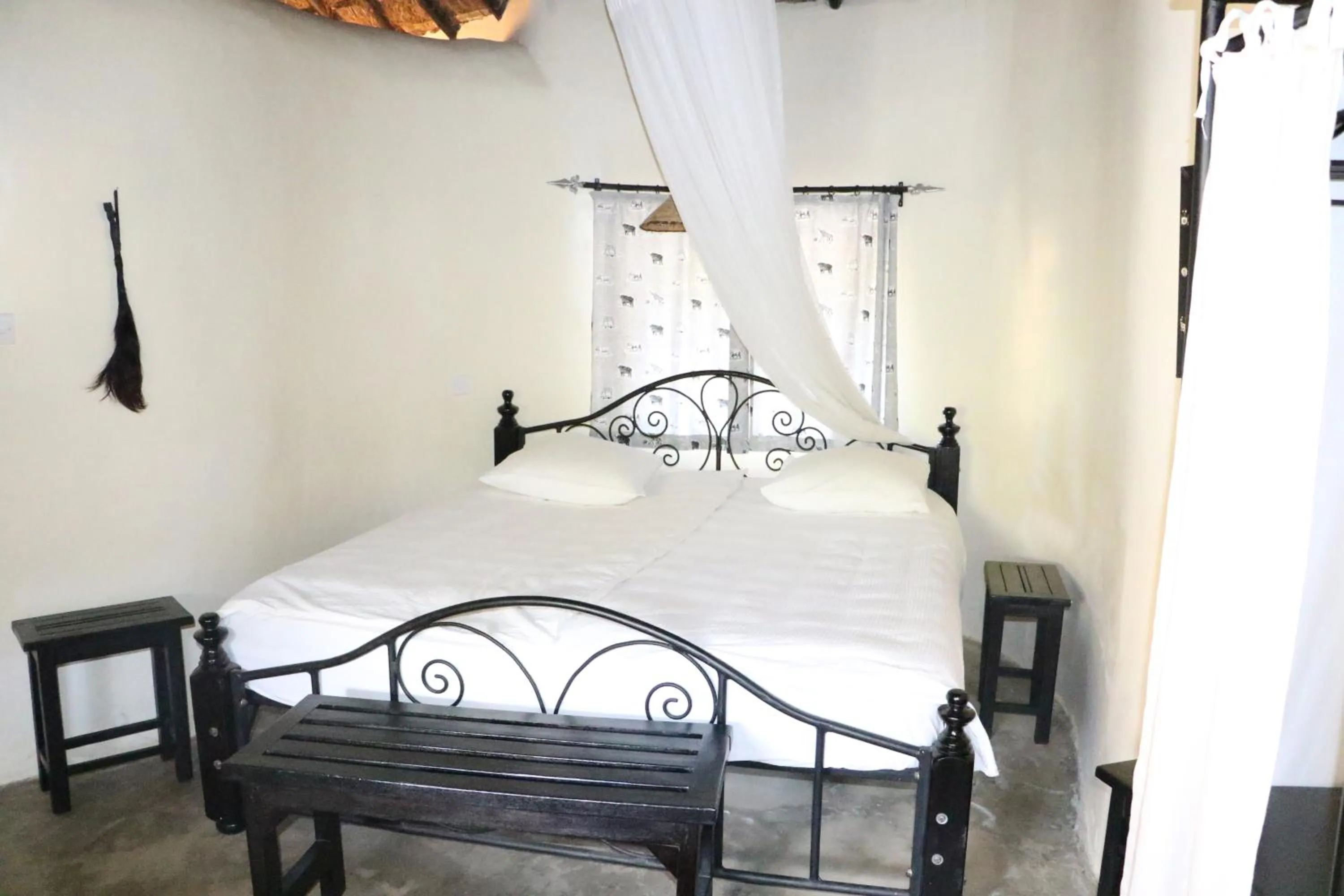 Bed in Nyati Hill Cottages