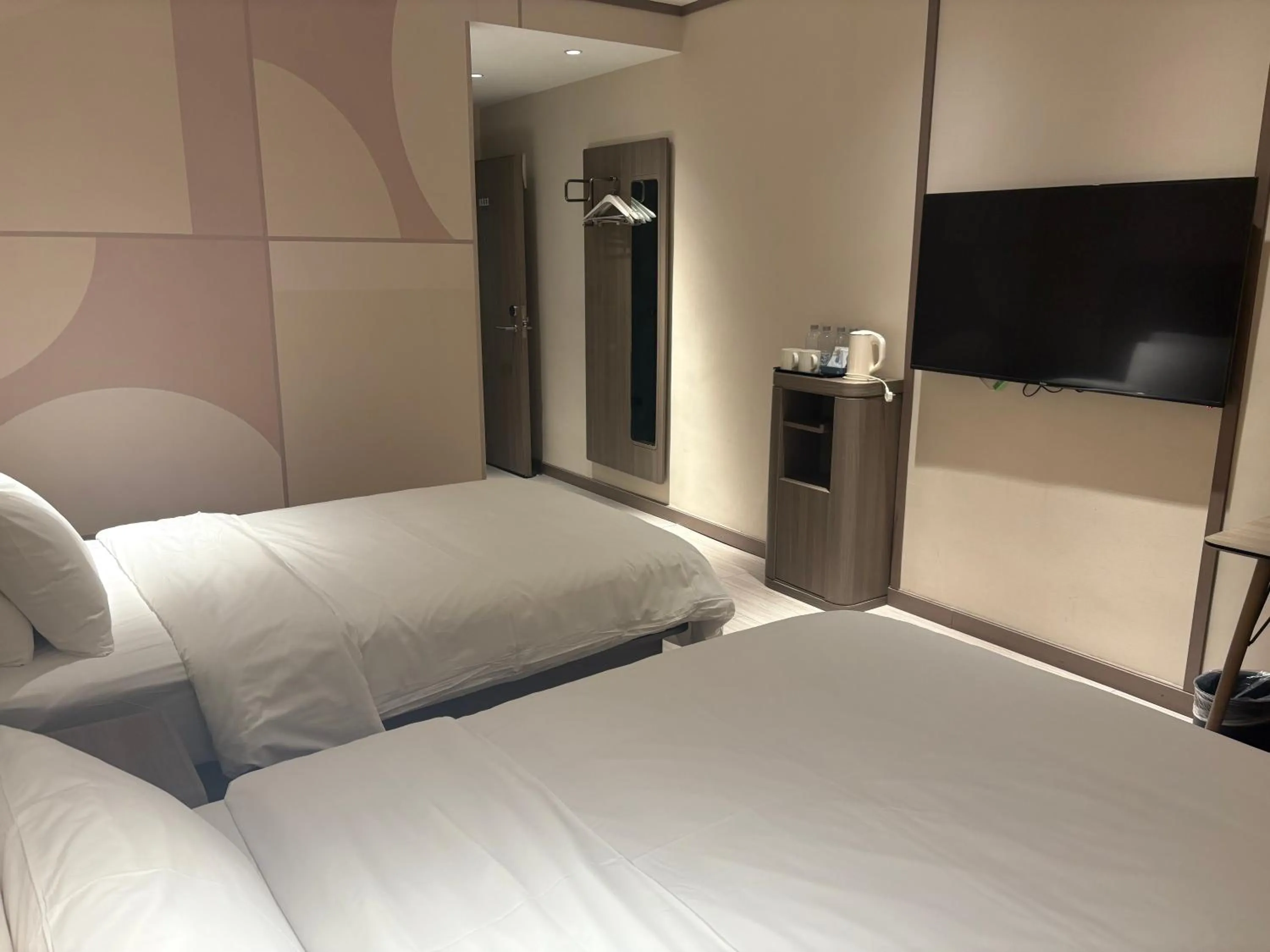 Bed in Hanting Beijing Chaoyang Railway Station Hotel