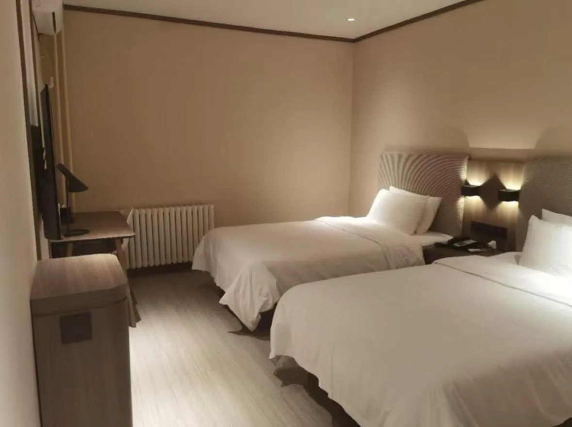 Bed in Hanting Beijing Chaoyang Railway Station Hotel