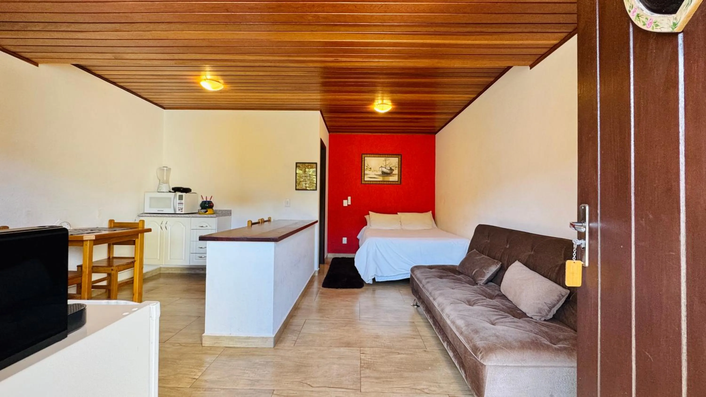 Seating area in Chalés Leopoldo em Monte Verde