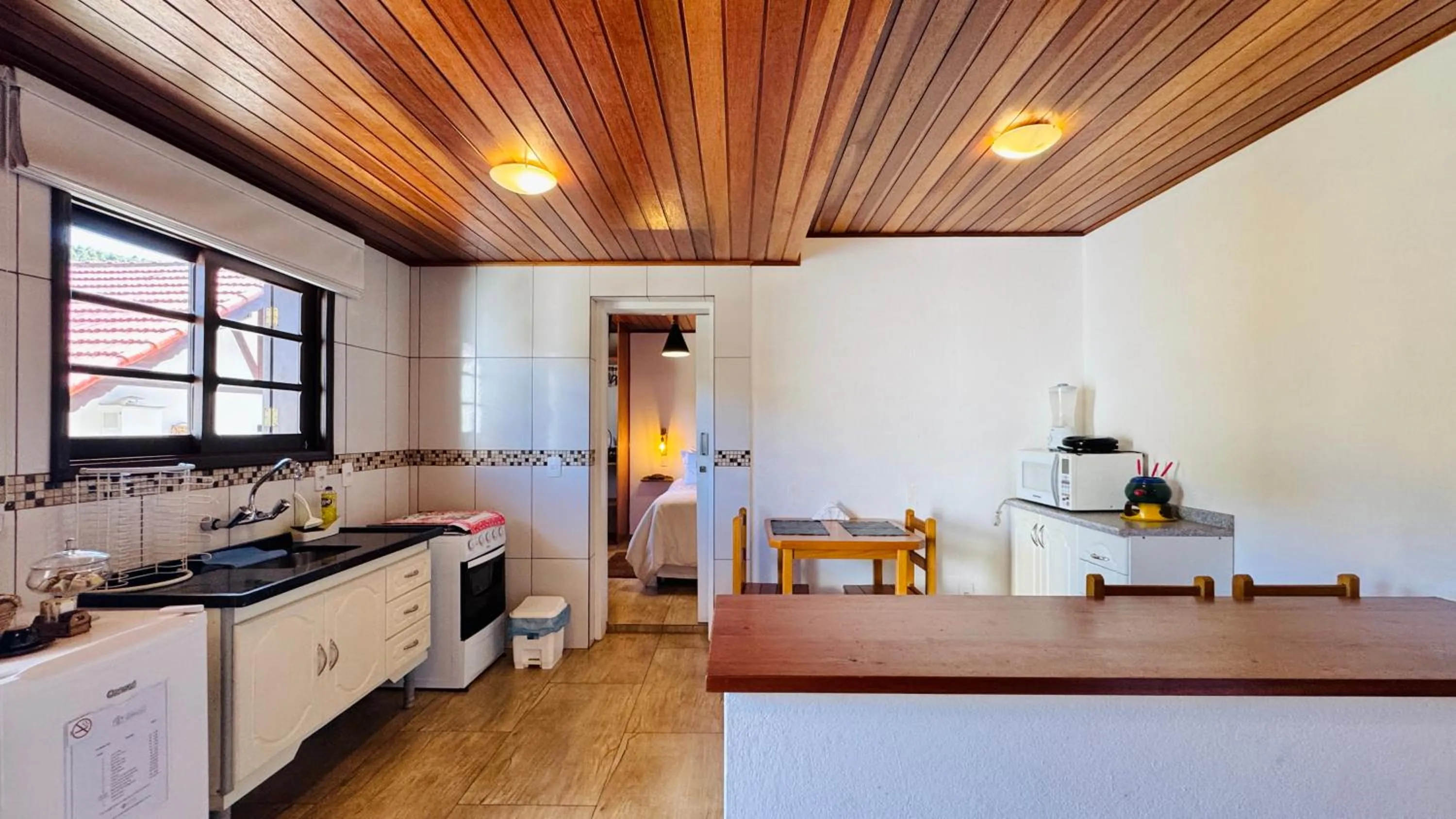 Kitchen or kitchenette in Chalés Leopoldo em Monte Verde