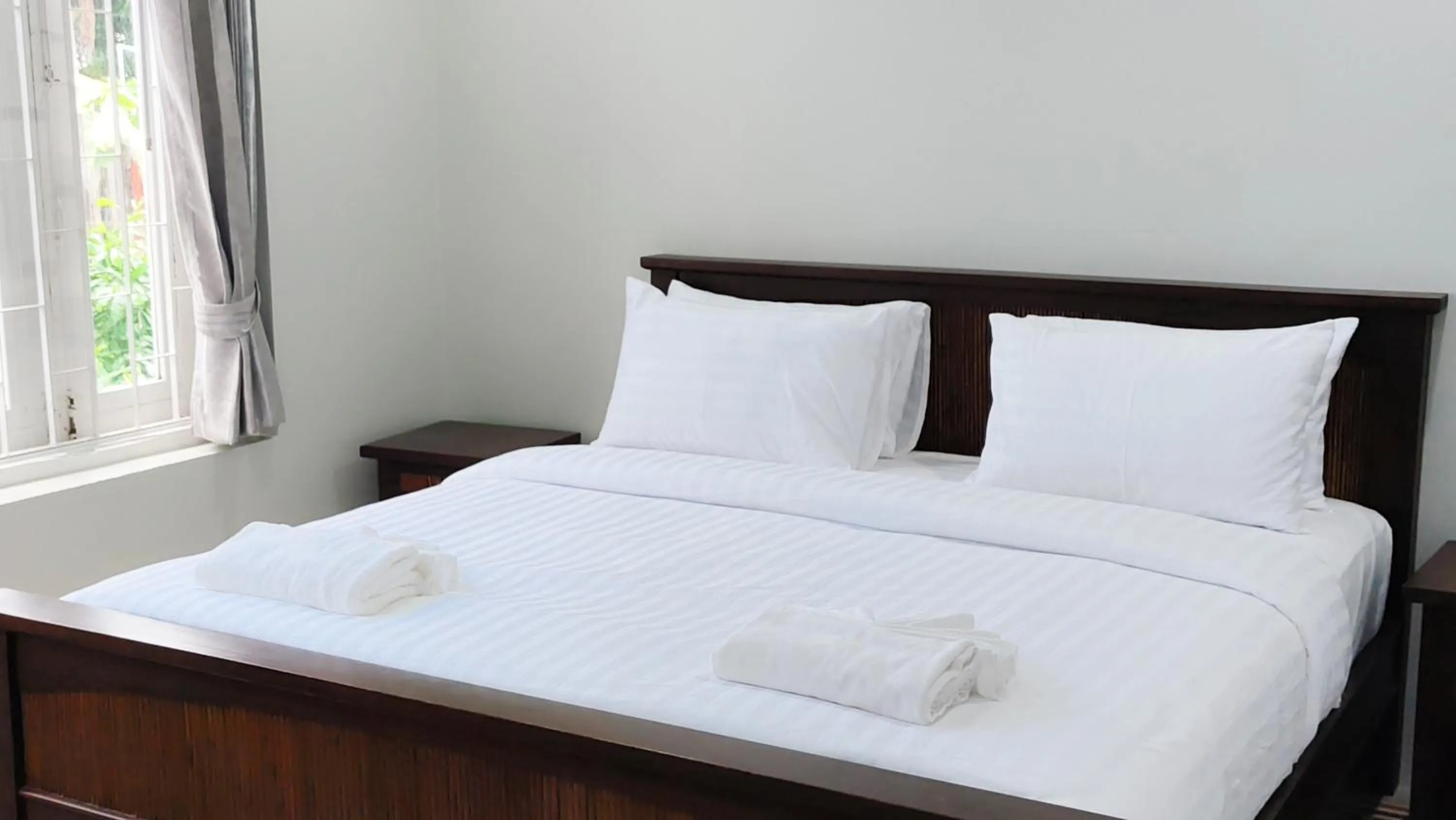 Bed in Baan Toom Village and Resort