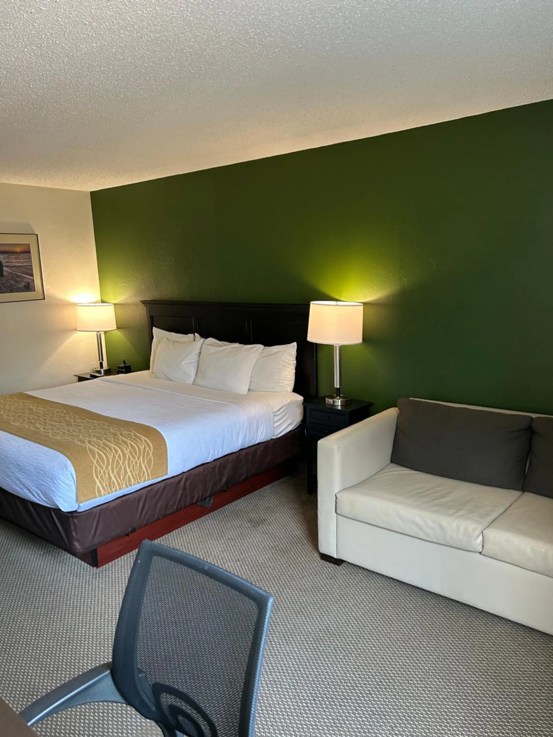 Bed in Boarders Inn & Suites by Cobblestone Hotels - Munising