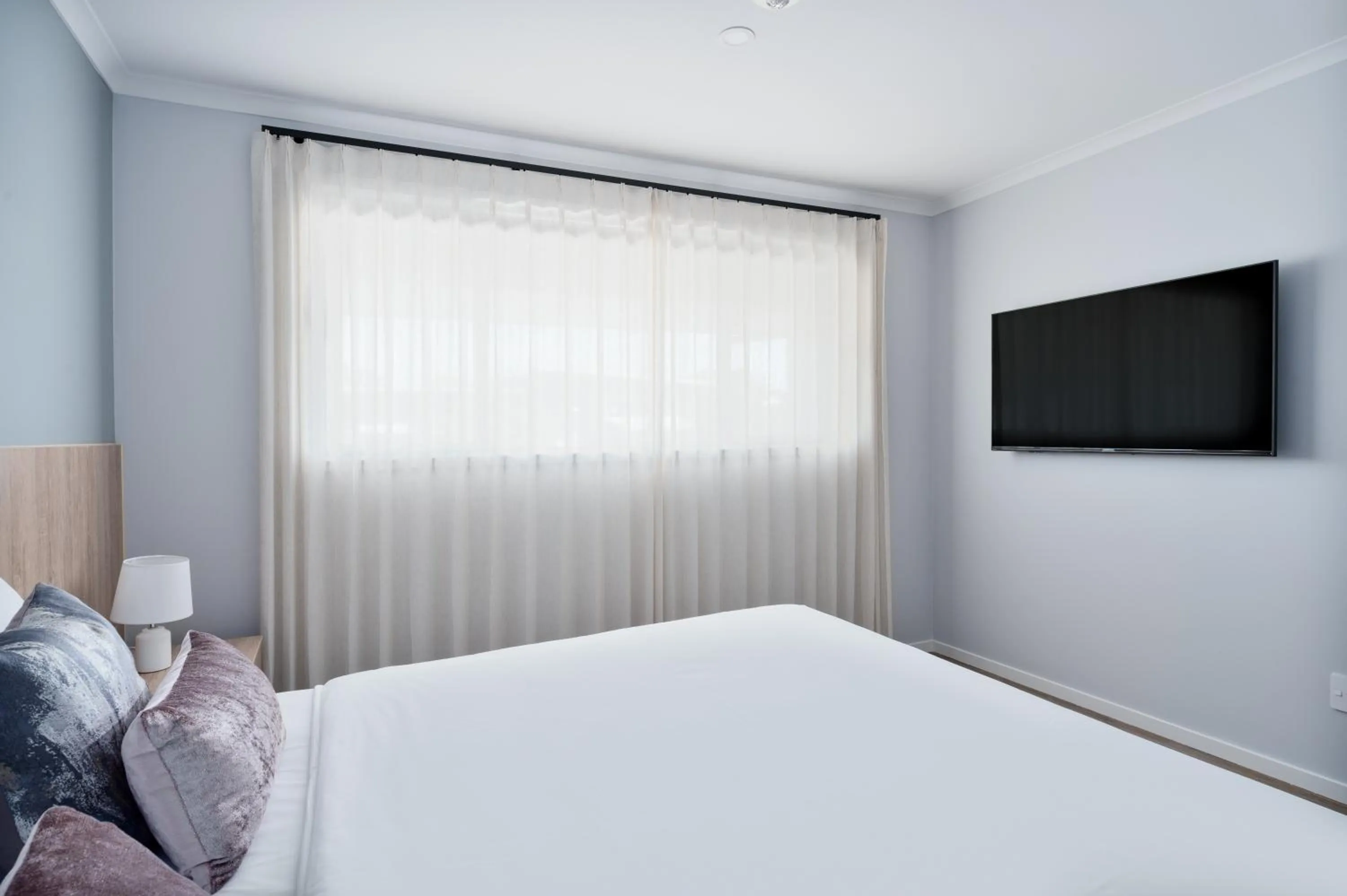 Bed in Albany Oak Motel