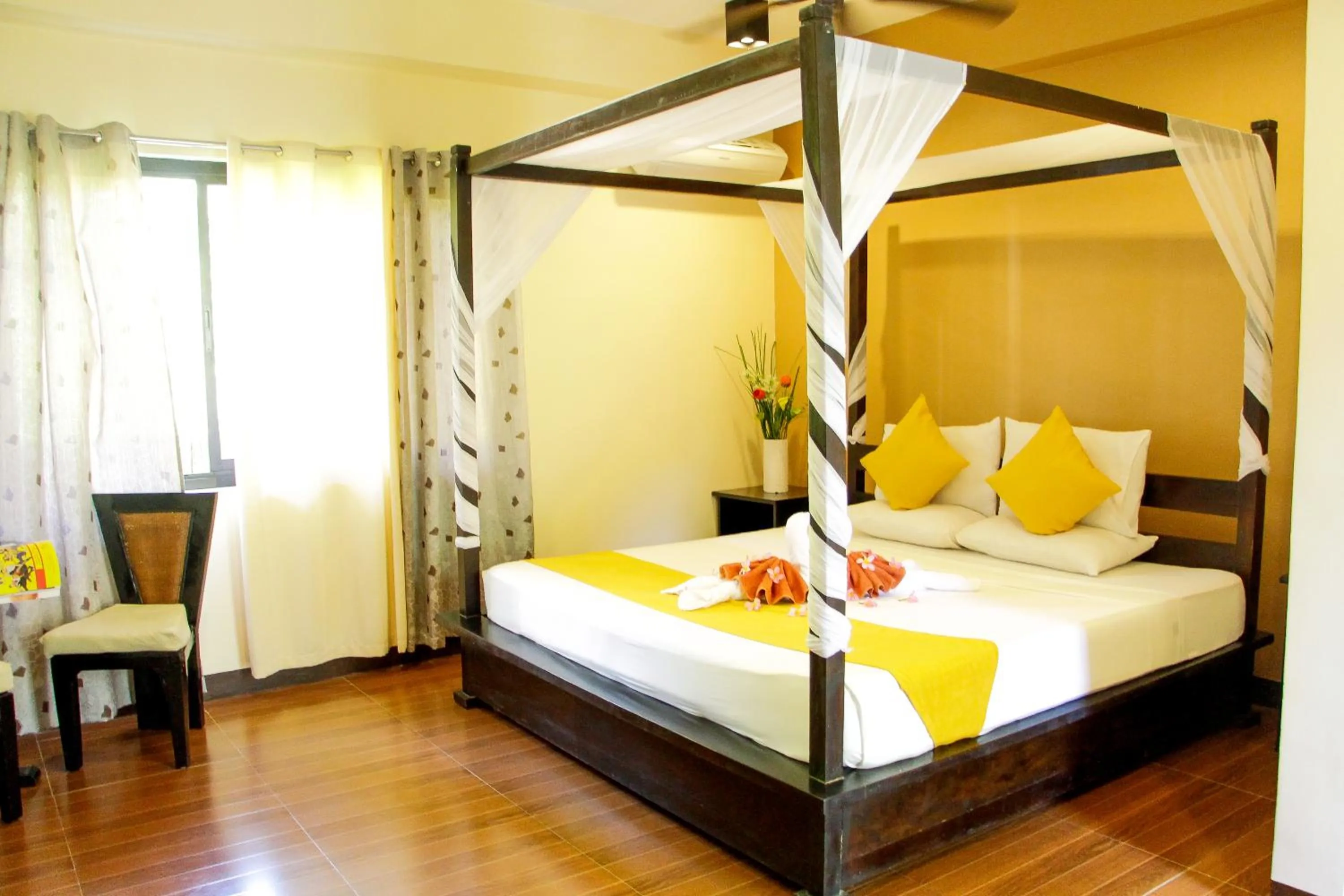 Bed in Sulu Sea Boutique Hotel