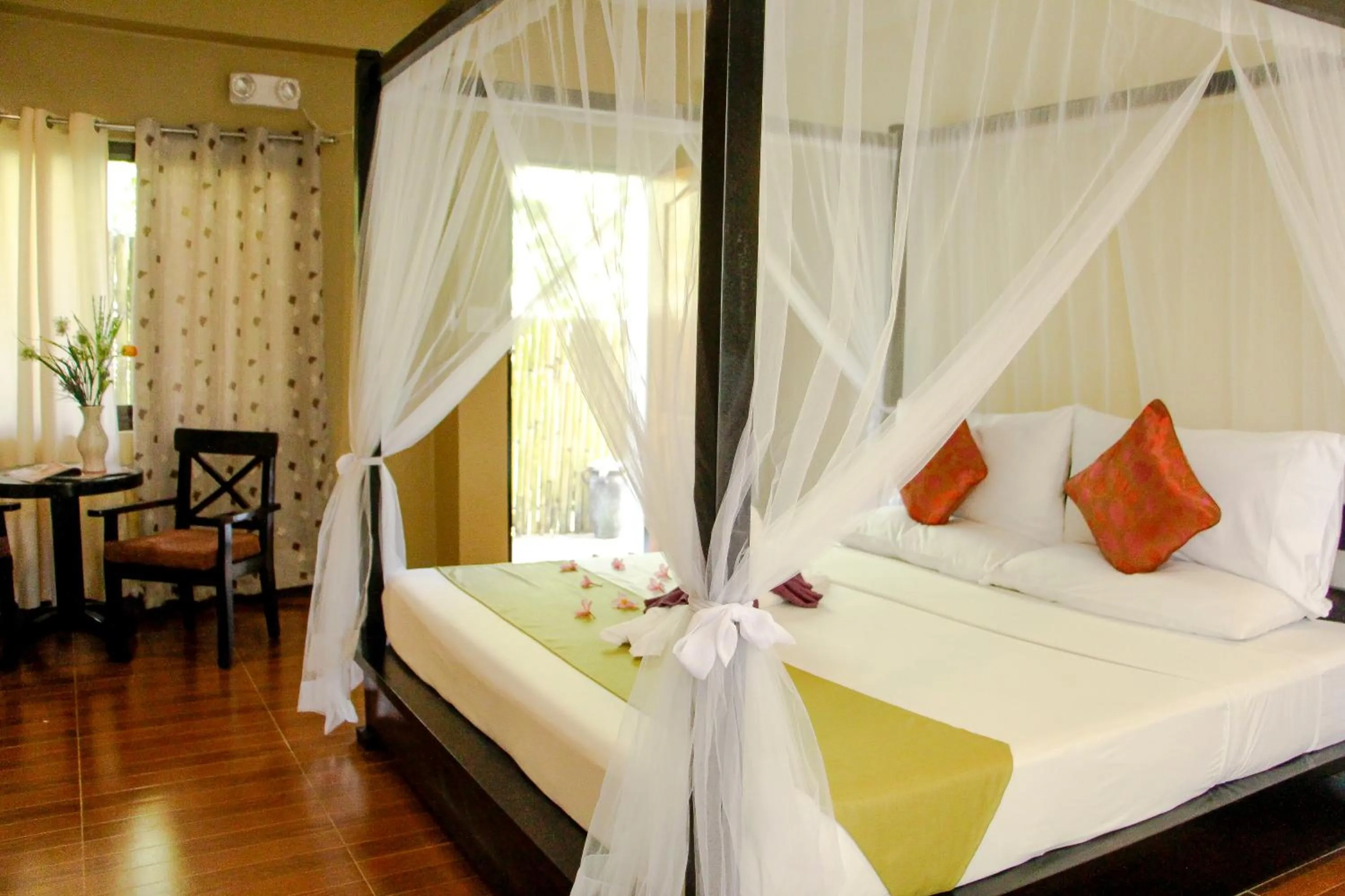 Bed in Sulu Sea Boutique Hotel