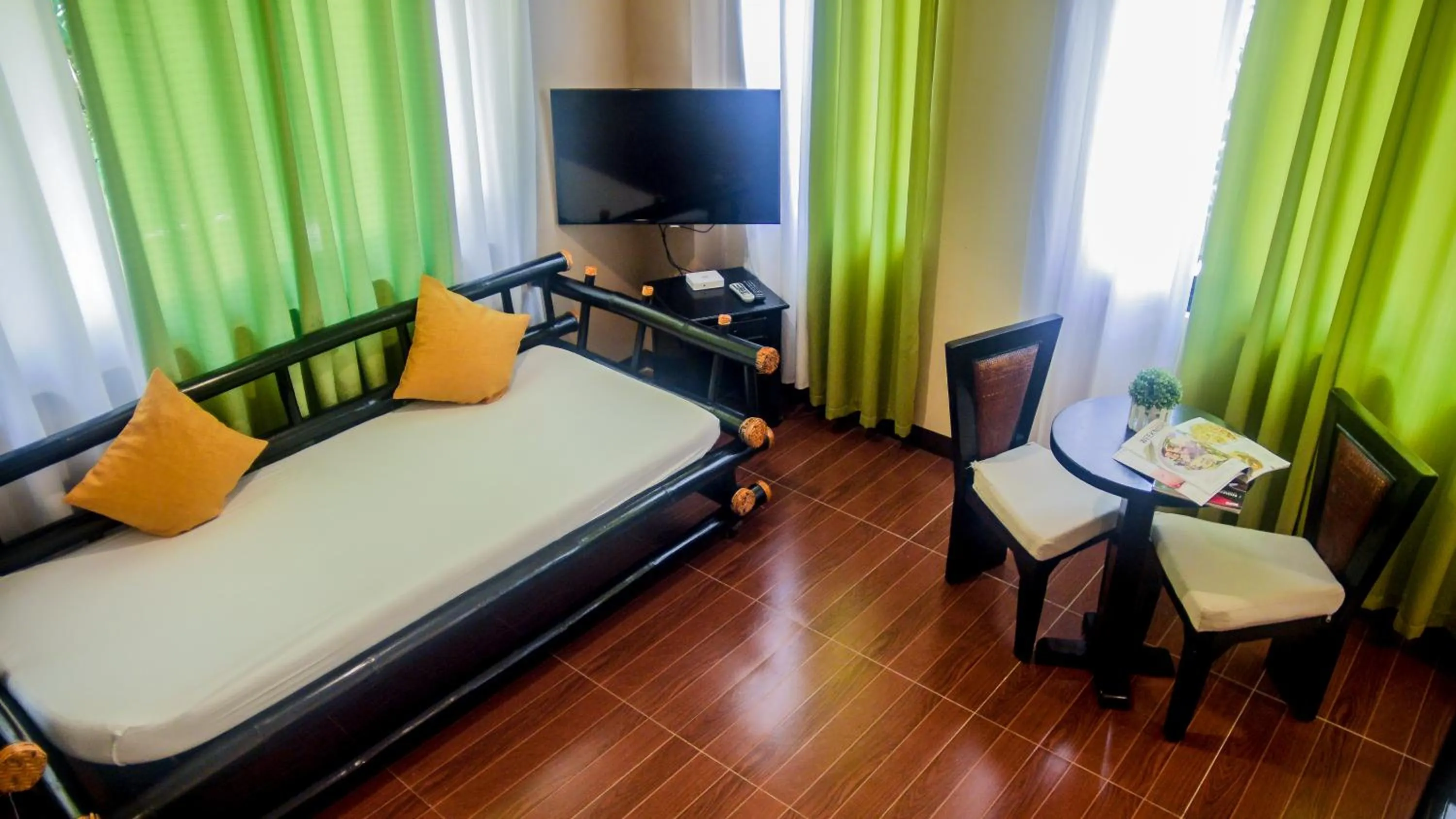 Bed in Sulu Sea Boutique Hotel