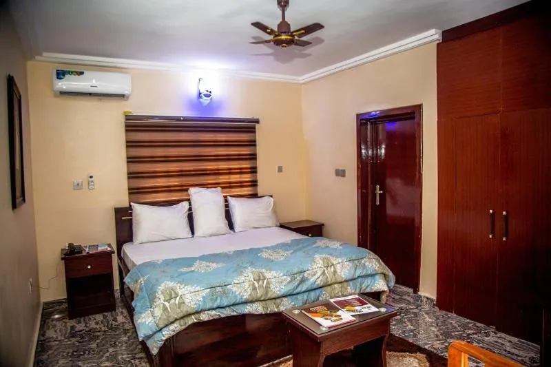 Bed in Kay Luxury Suites