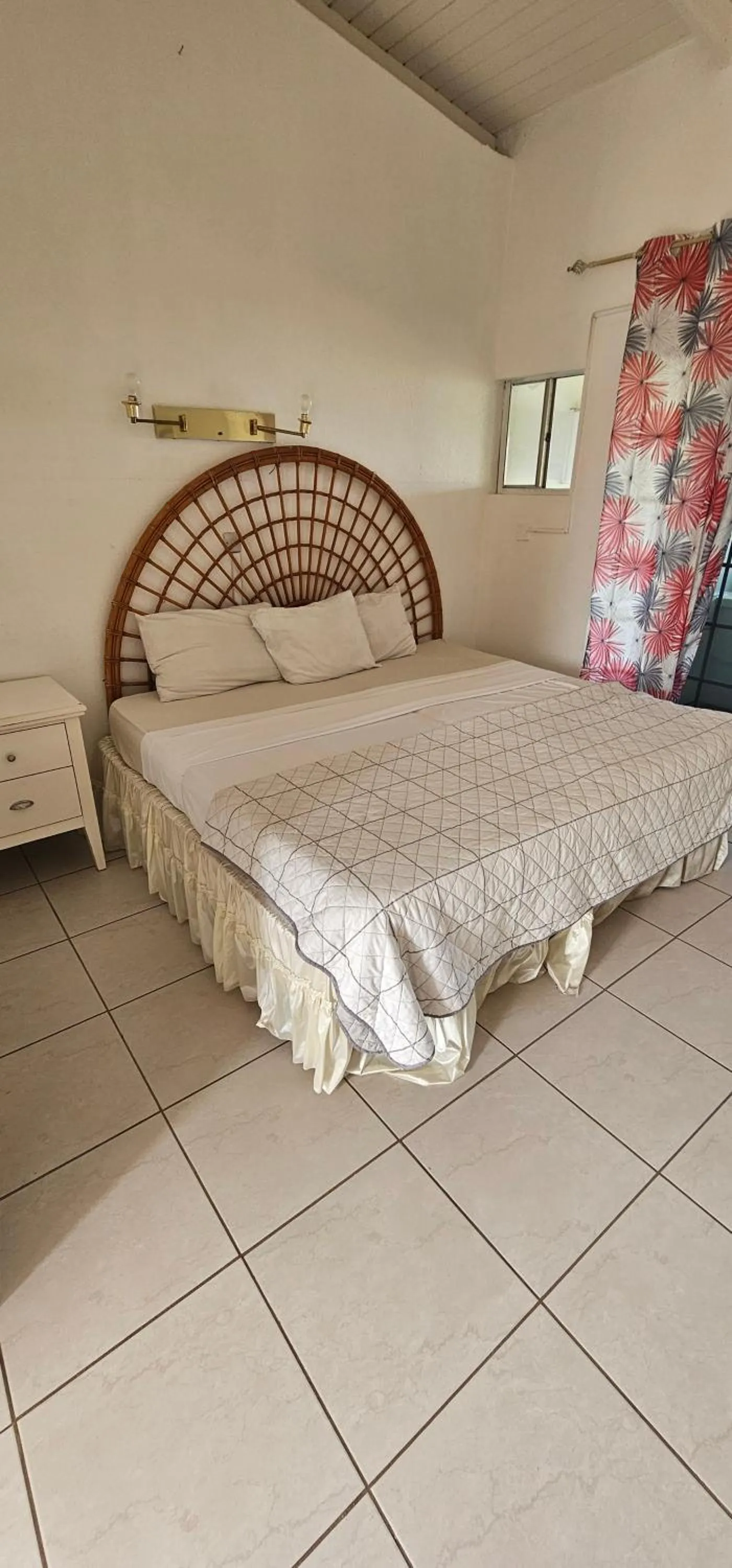 Bed in Wavecrest Suites