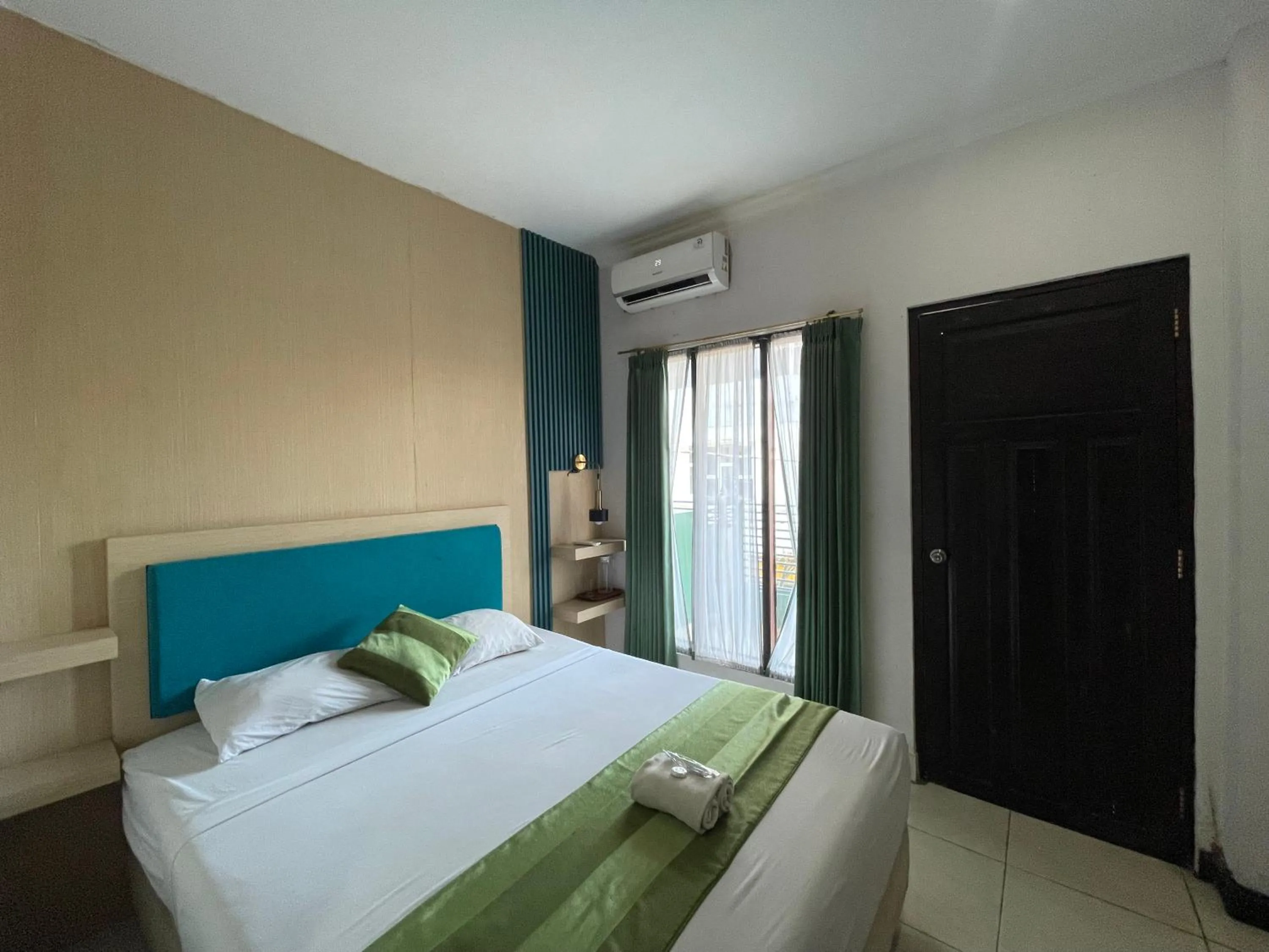 Bed in Klungkung Tower Hotel