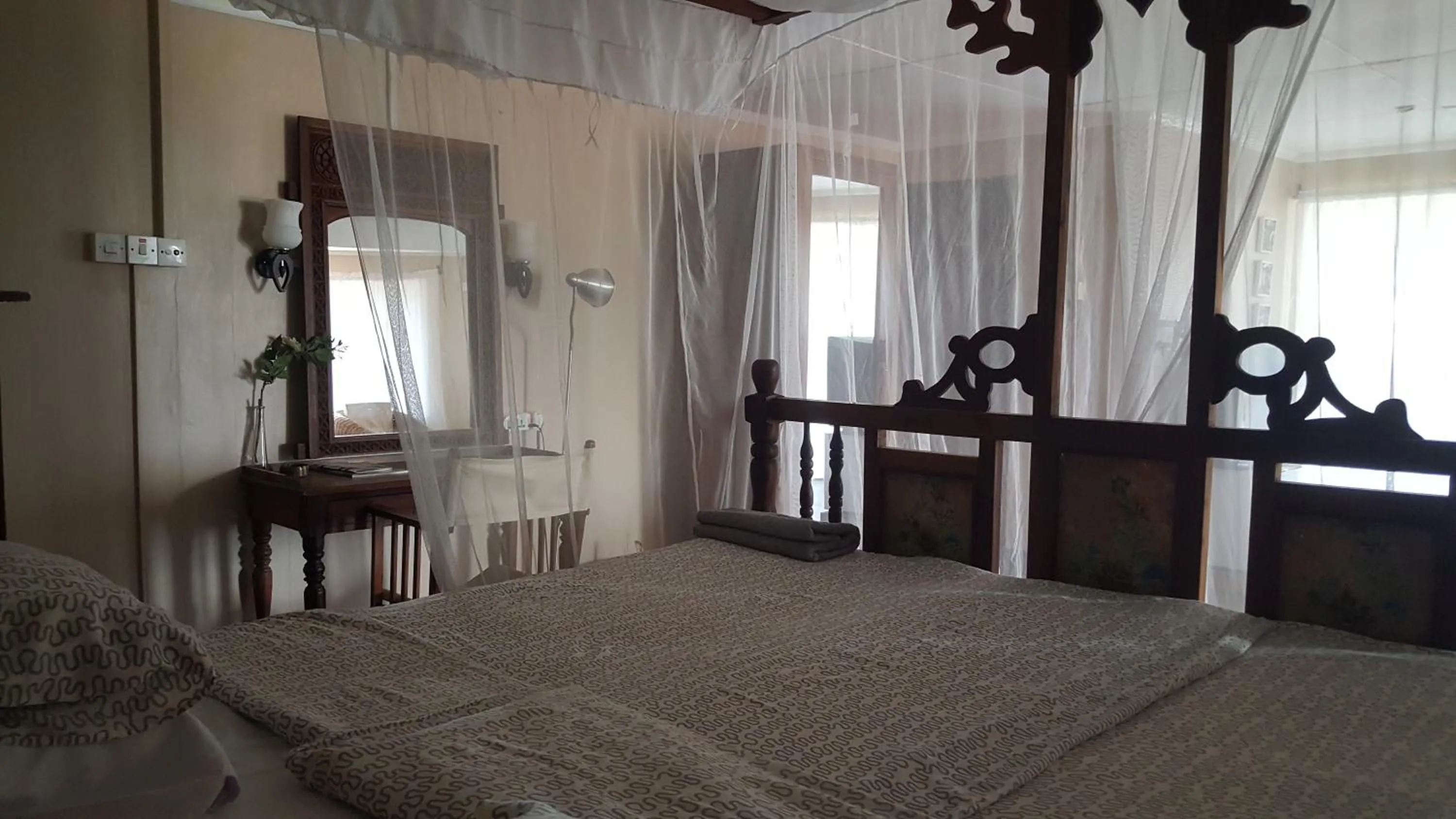 Bed in Q-Bar & Guesthouse