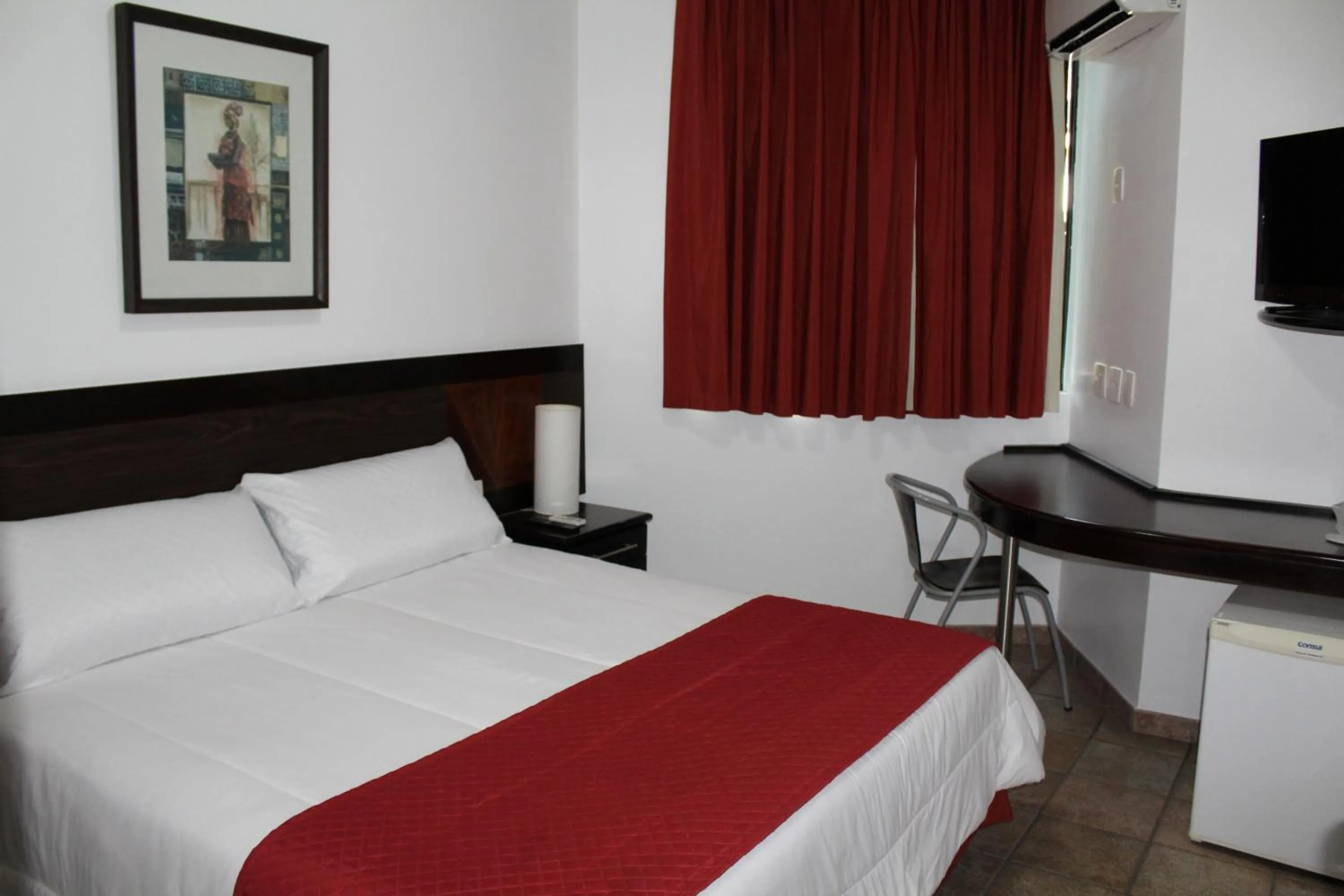 Bed in Hotel Dom Henrique