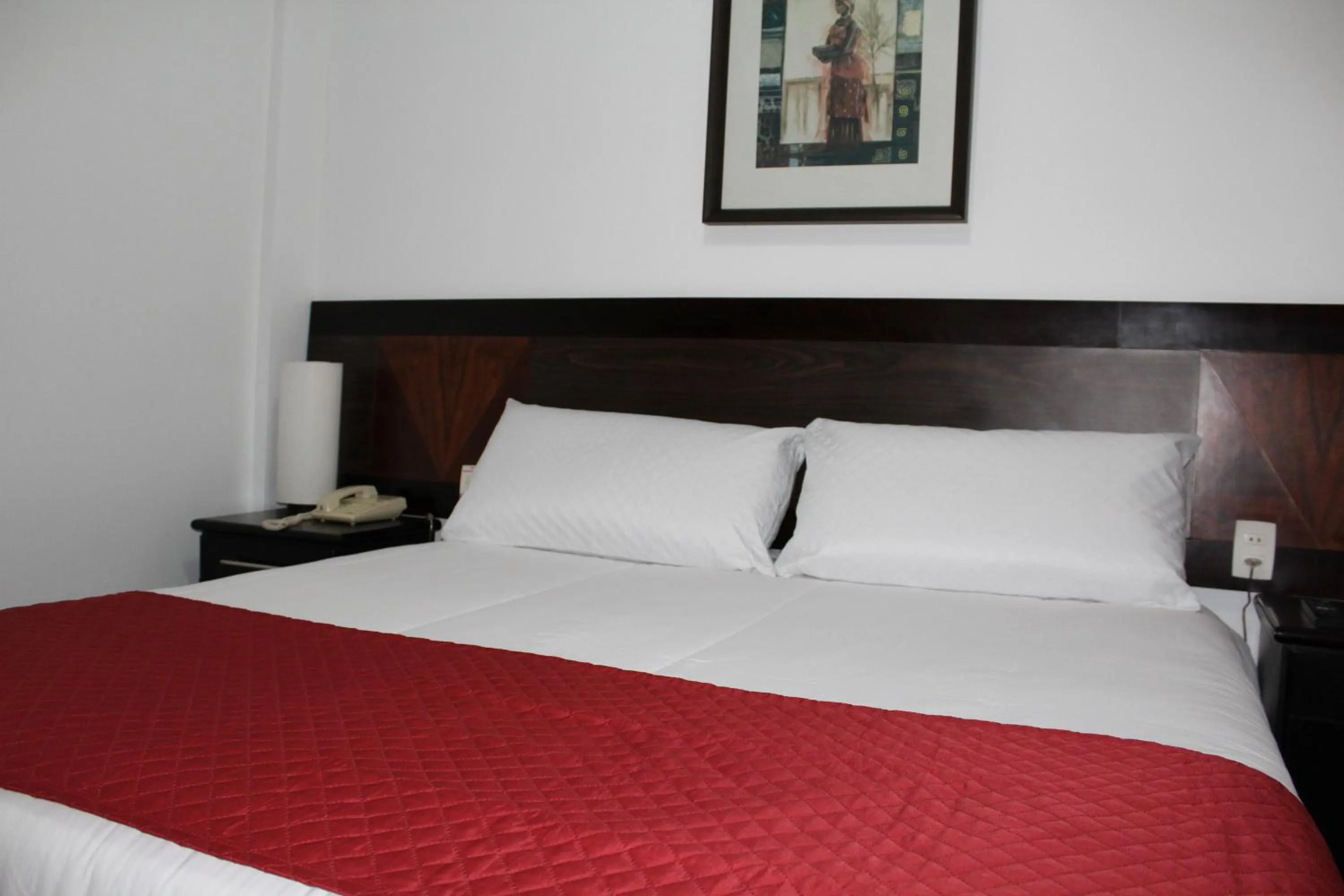 Bed in Hotel Dom Henrique