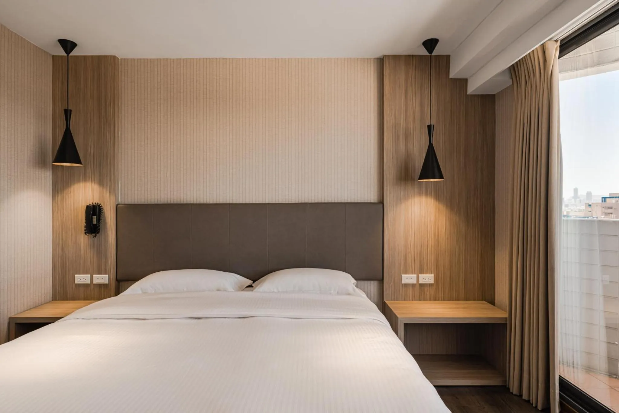 Bedroom, Bed in The Riverside Hotel International