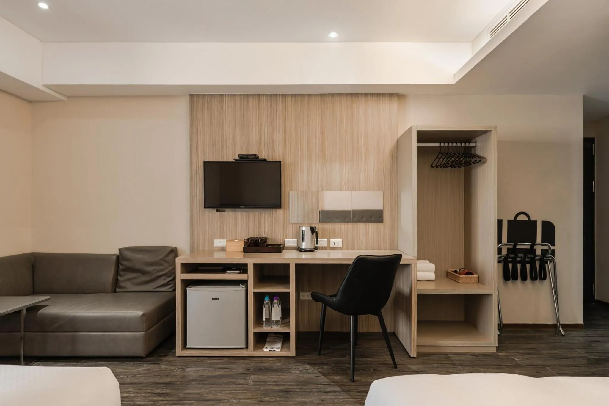 Bedroom in The Riverside Hotel International