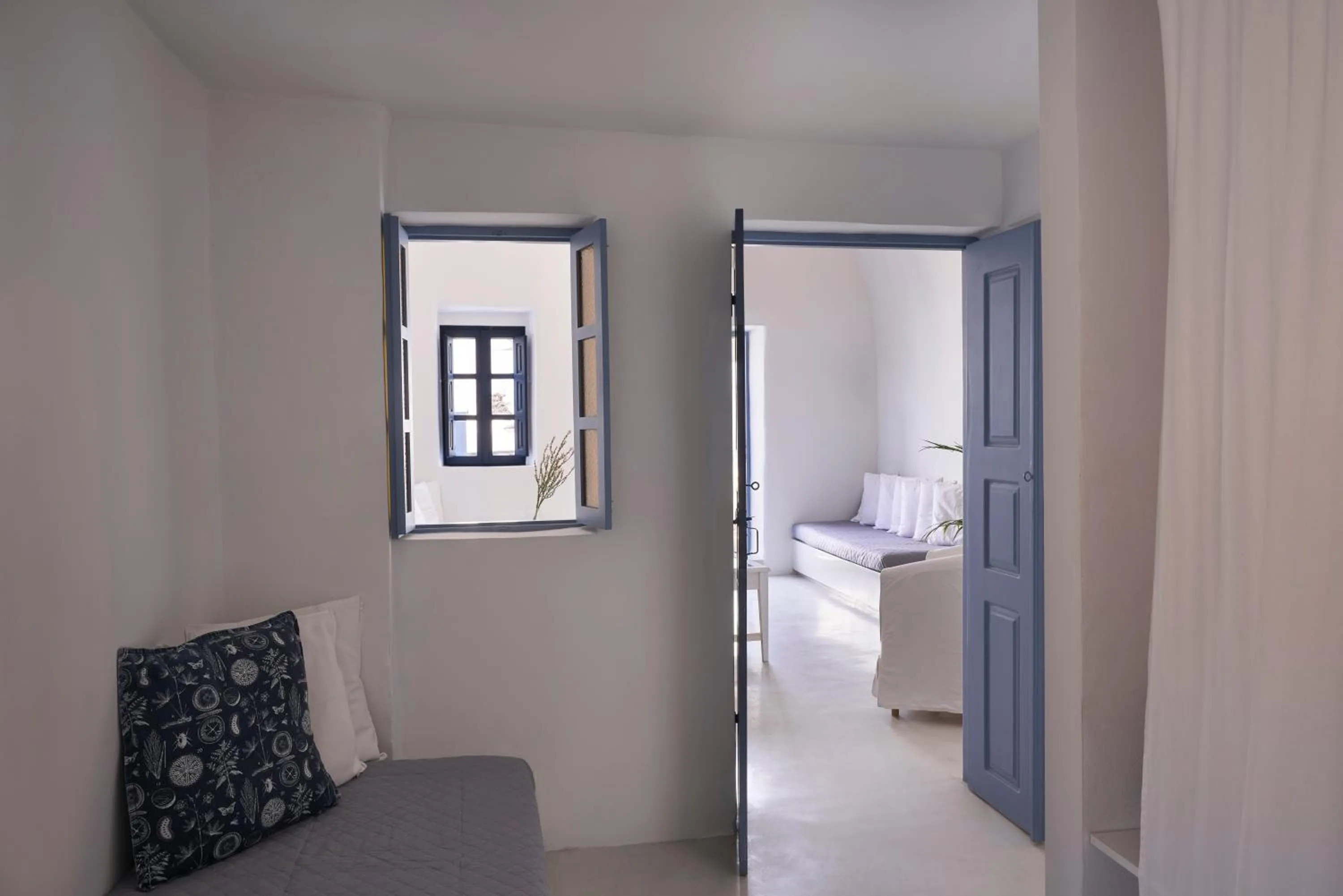 Living room, Bed in Fava Eco Suites