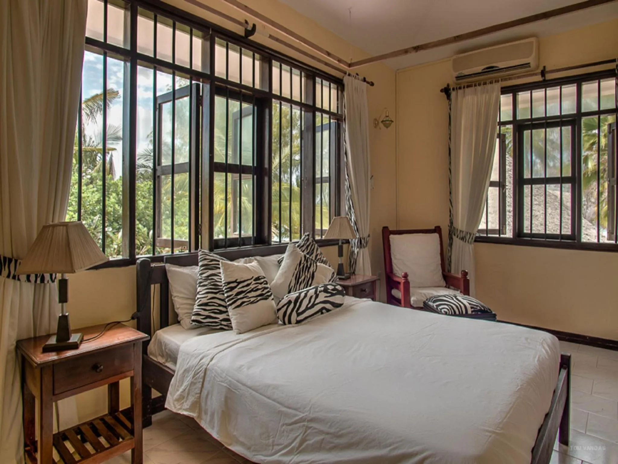 Bed in Bahari Dhow Beach Villas