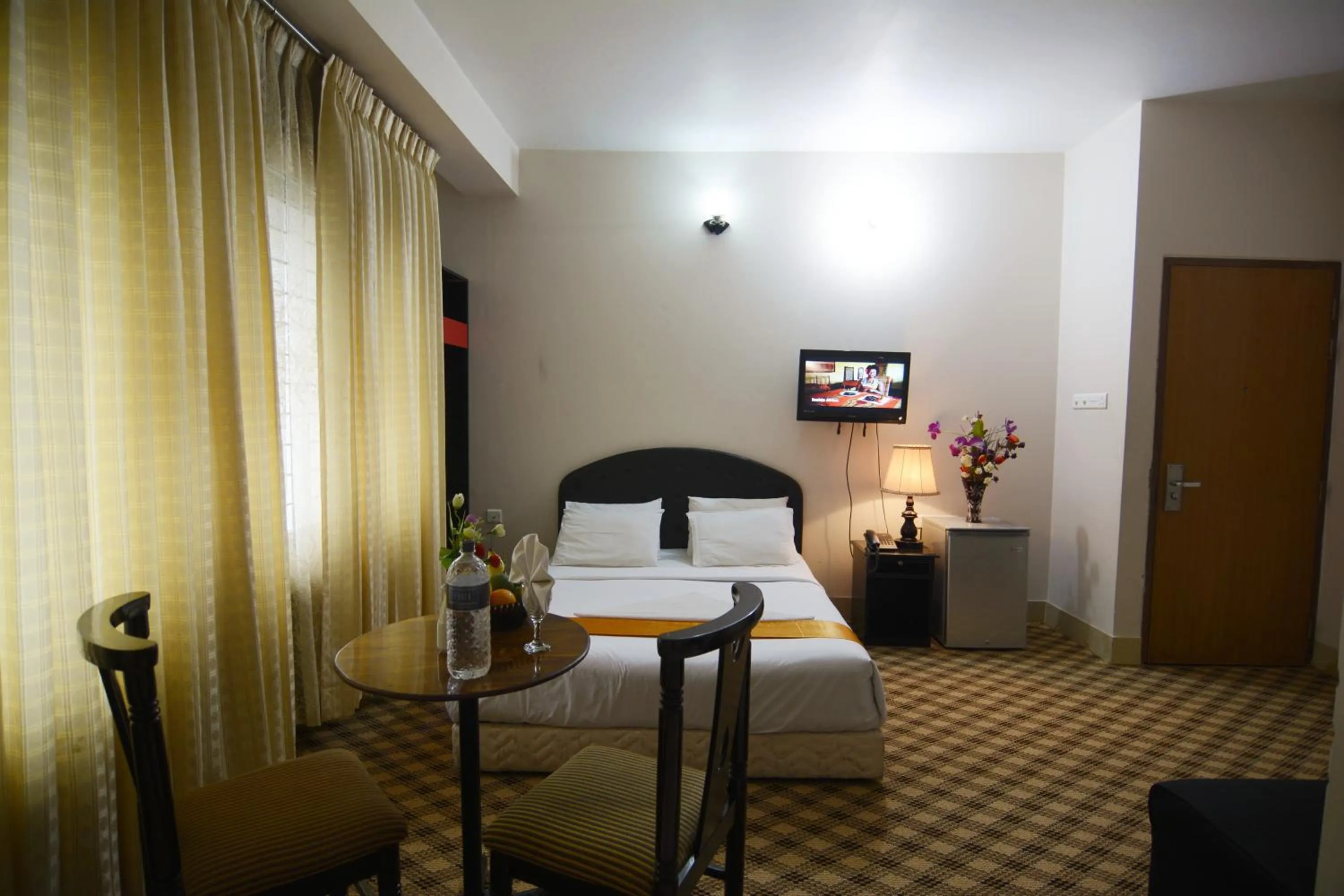 Photo of the whole room, Bed in Holiday Xpress