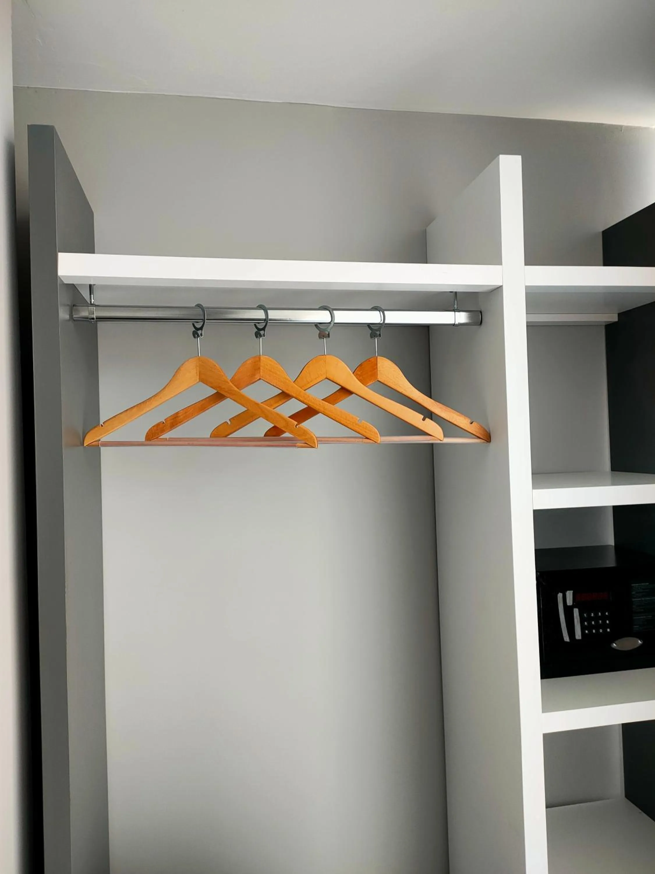 wardrobe in Loft Airport Hotel