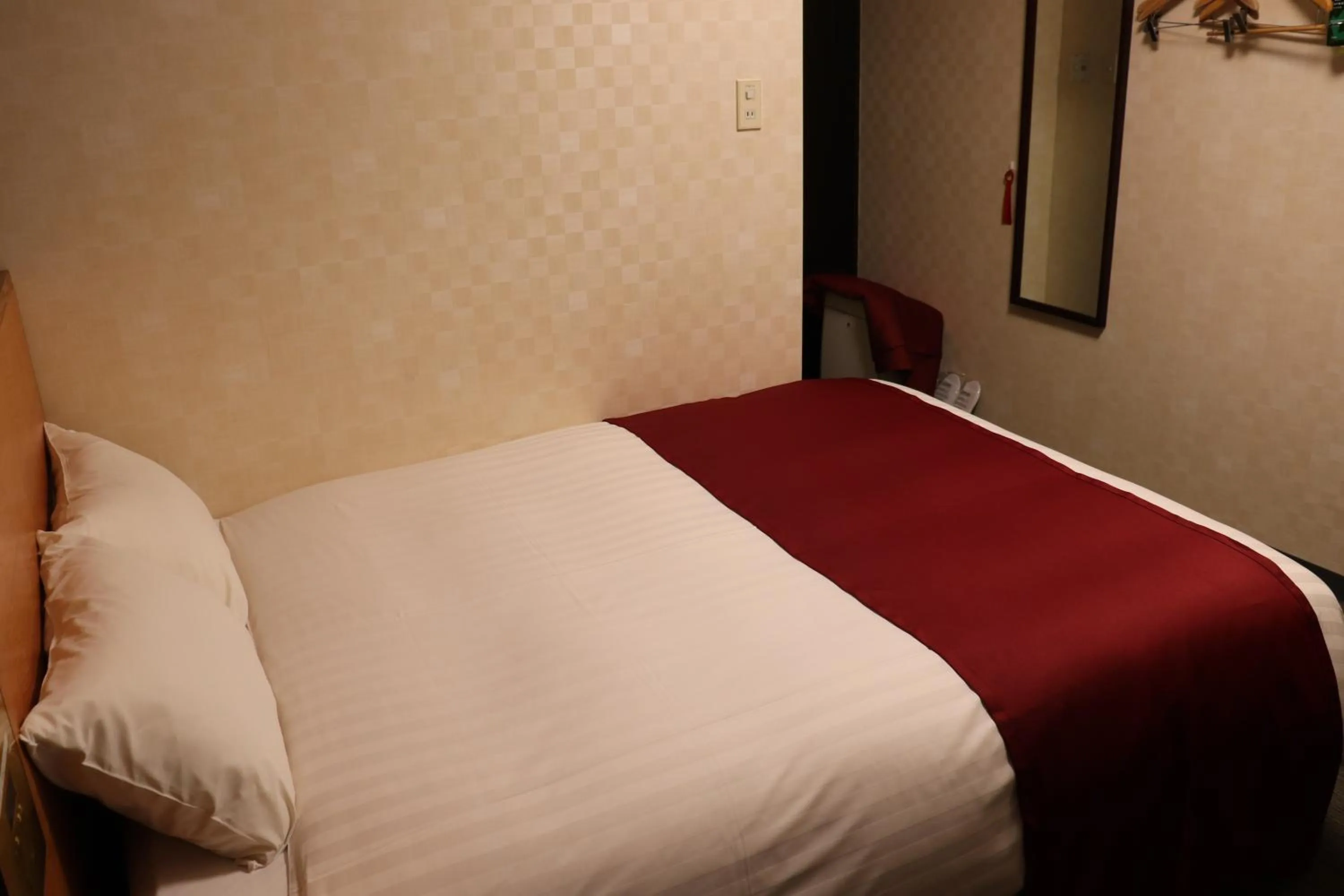 Bed in Pioland Hotel