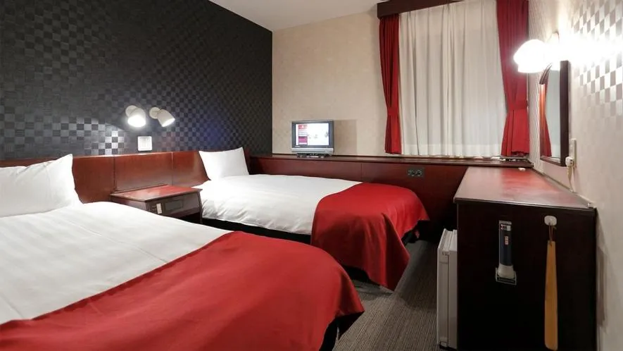 Bed in Pioland Hotel