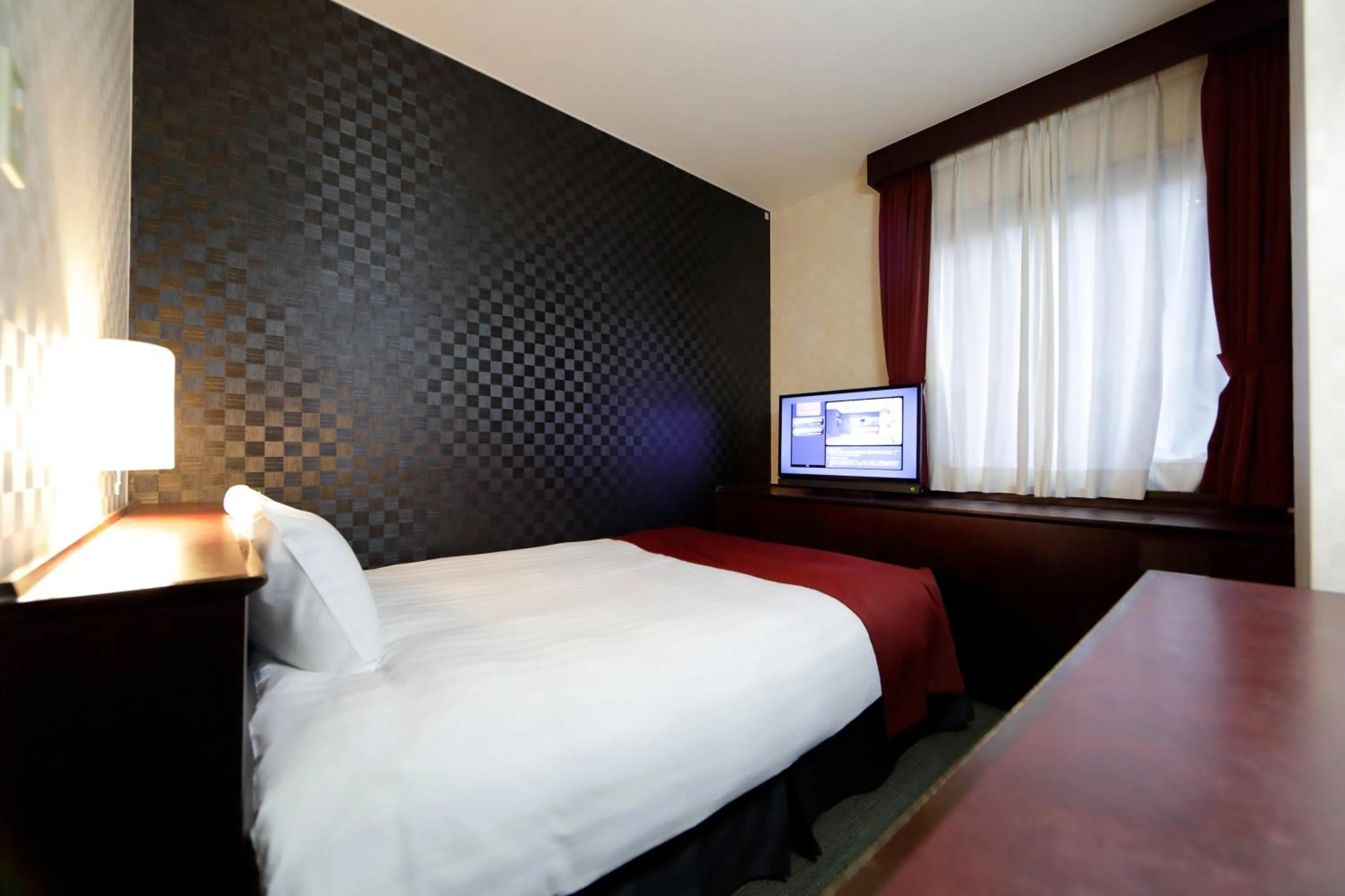 Bed in Pioland Hotel