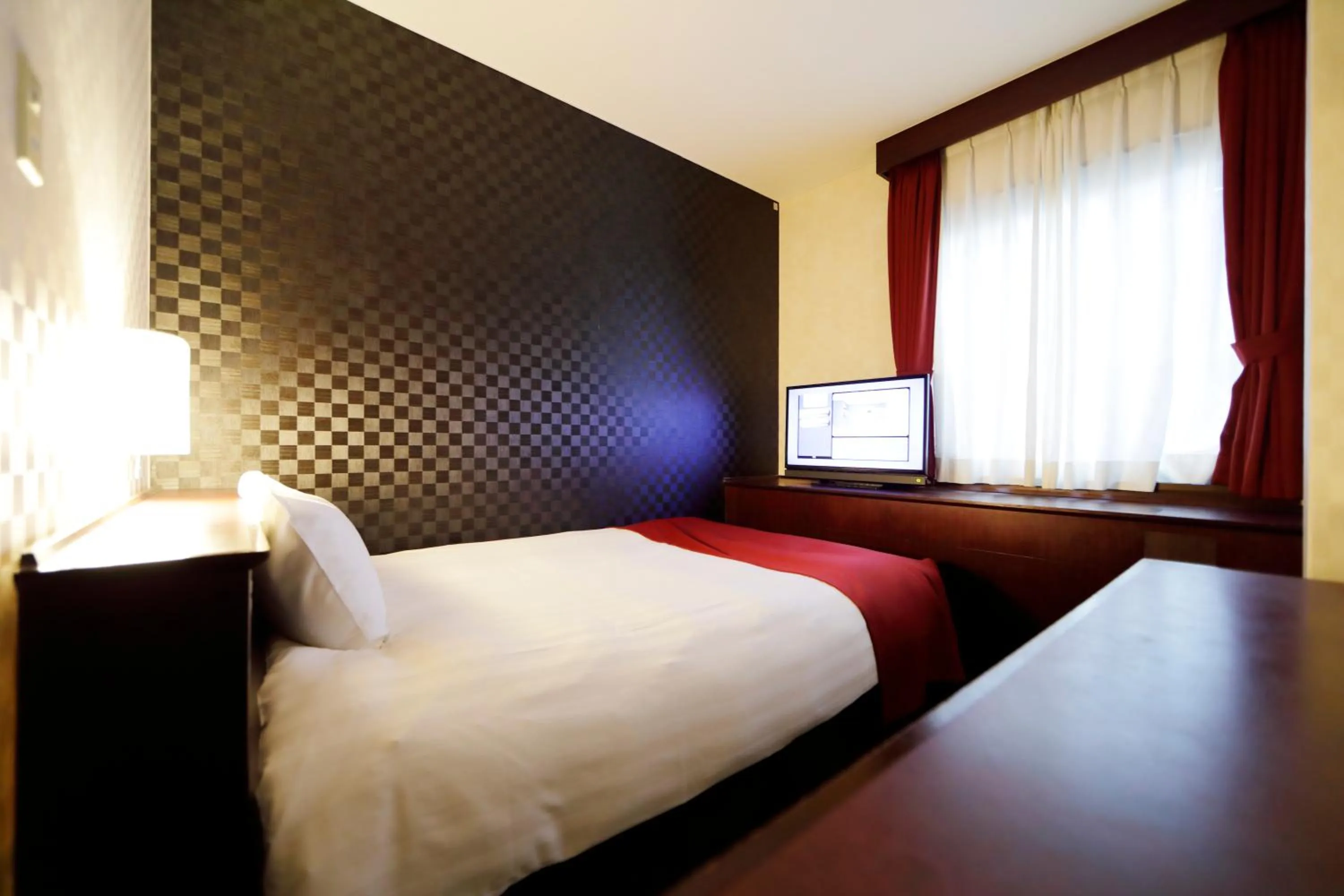 Bed in Pioland Hotel