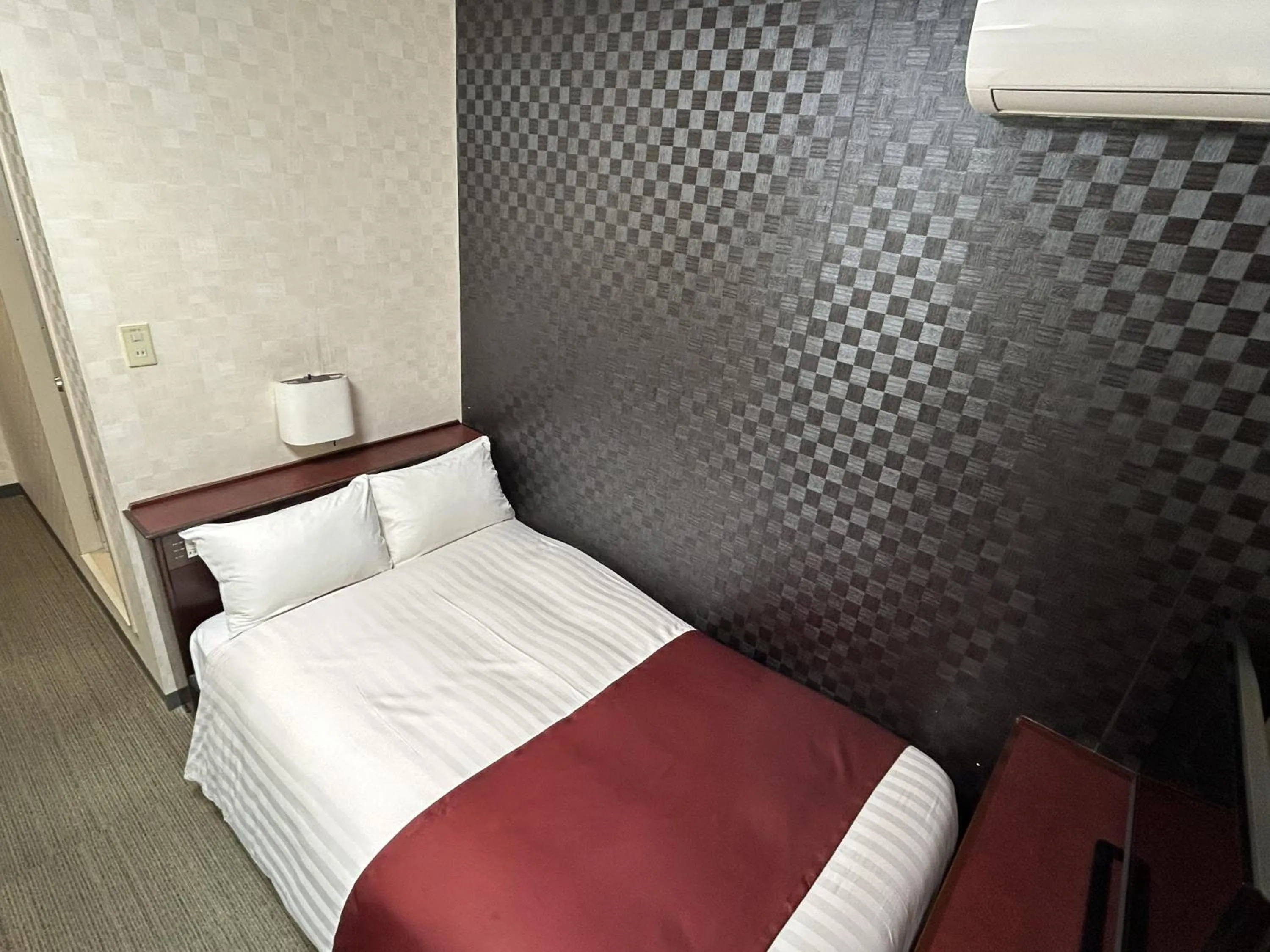 Bed in Pioland Hotel