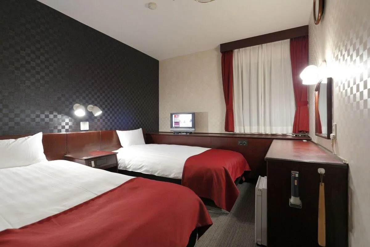 Bed in Pioland Hotel